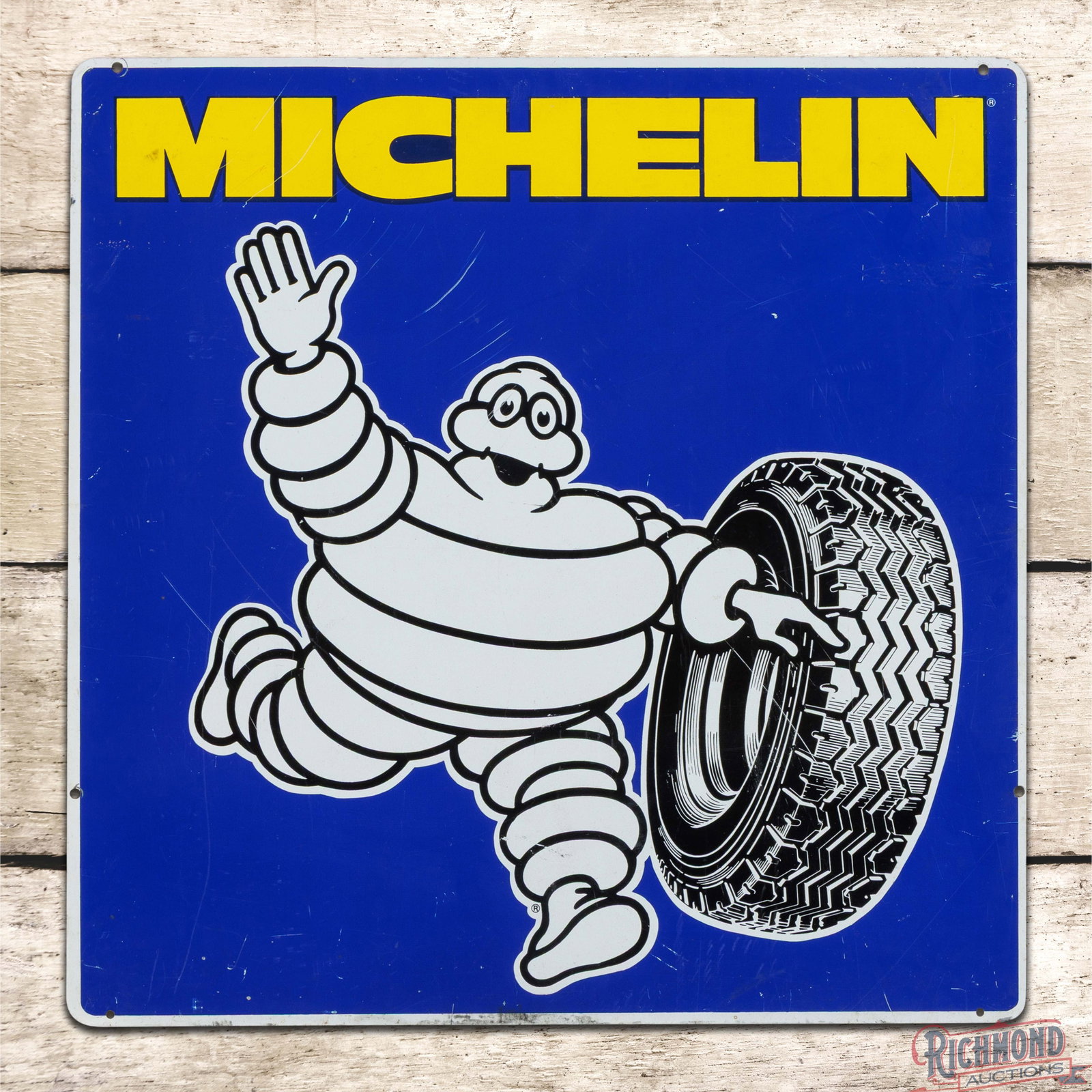 Michelin Tires 24" Single Sided Tin Sign w/ Bibendum: SST (single sided tin) sign has excellent color and shine. The display has areas of surface wear with scuffs and scratches in the fields. The perimeter has minor edge bends with a few small paint chip