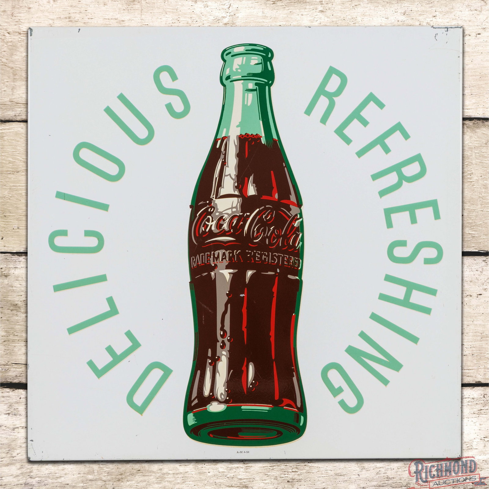 1954 Coca Cola "Delicious Refreshing" 24" Single Sided Tin Sign w/ Bottle: SST (single sided tin) rolled edge Coke sign has very good color and shine. The field has light wear with fine scratches and a handful of small paint chips. The perimeter has additional scuffs and pai