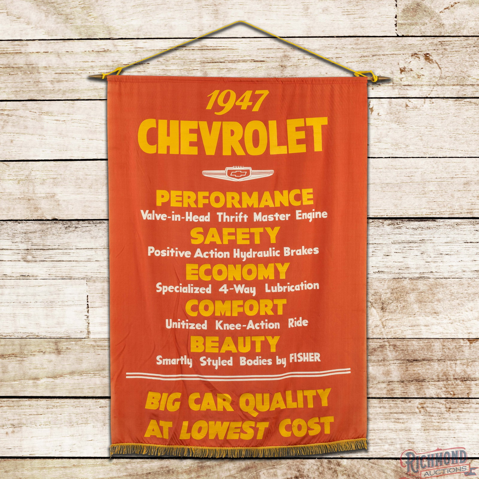 1947 Chevrolet Auto Dealer Cloth Banner: Very good condition with light wear throughout. Rare Banner. 56.5" H x 40" W. Condition: 8.0+. All items are guaranteed authentic by Richmond Auctions unless otherwise noted. Purchases are eligible fo
