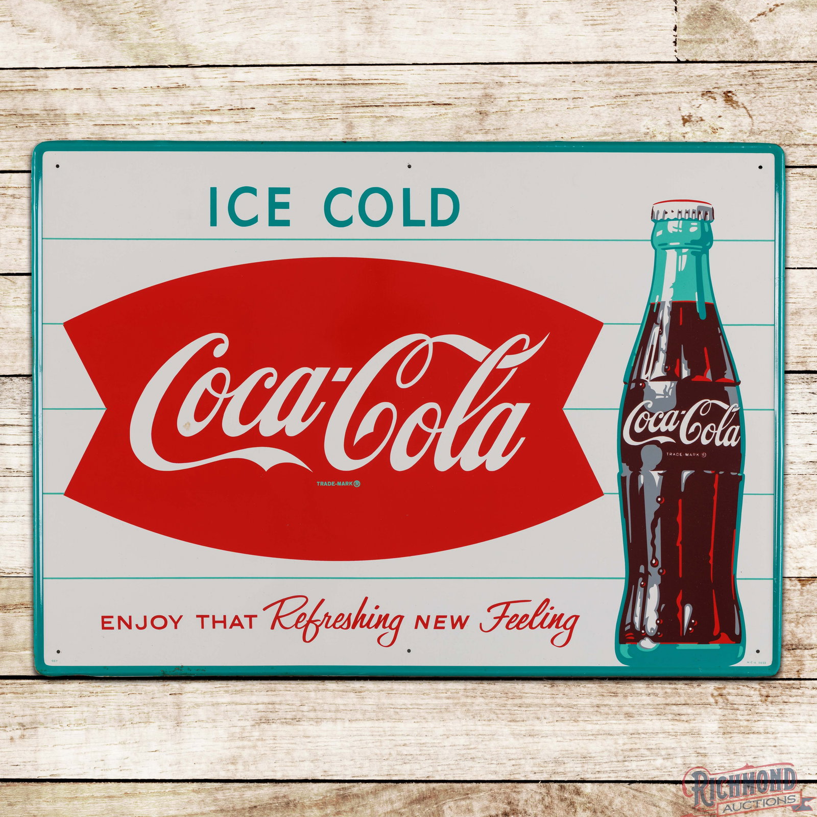 Ice Cold Coca Cola Enjoy That Refreshing New Feeling Single Sided Tin Sign w/ Bottle: SST (single sided tin) self-framed Coke sign has excellent color and shine. The display has minor paper marks with a small discolored spot in the left field. The perimeter has small edge bends with mi