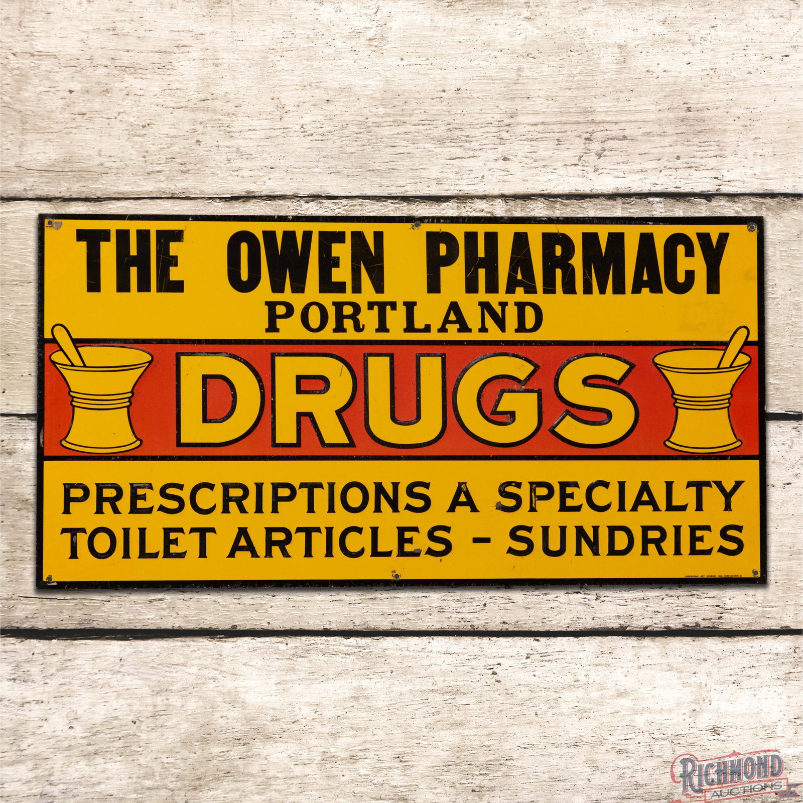 The Owen Pharmacy Portland Drugs Emb. Single Sided Tin Sign: SST (single sided tin) embossed sign has excellent color and shine. The display has light wear with paper marks and paint chips. The outer fields have additional fine scratches and the outer edges hav