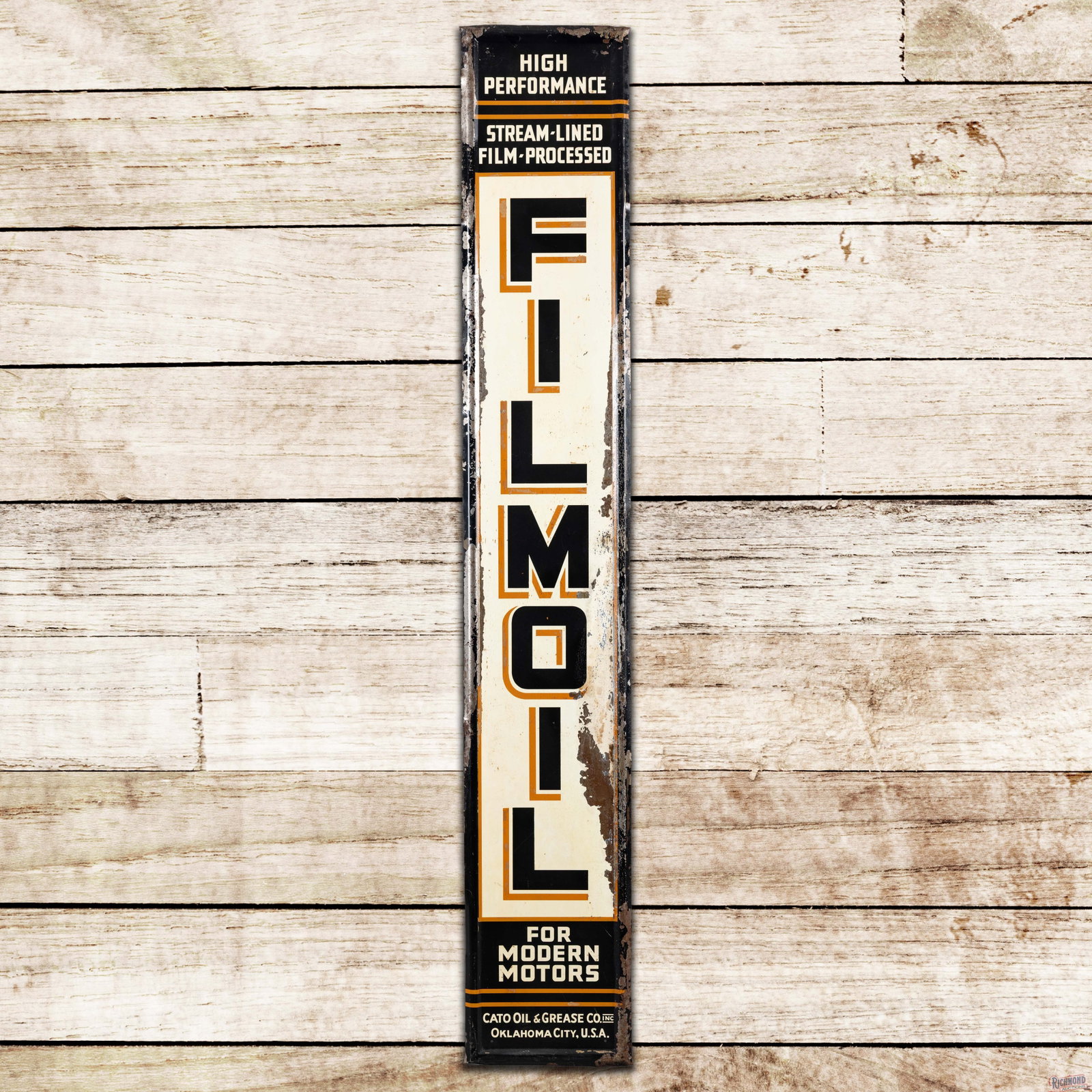 Filmoil For Modern Motors Cato Oil & Grease Co. Single Sided Tin Sign Oklahoma City OK: SST (single sided tin) self-framed sign has good color and shine. The display has general wear with paper marks, discoloration and active paint loss. The perimeter has surface wear with small bends an