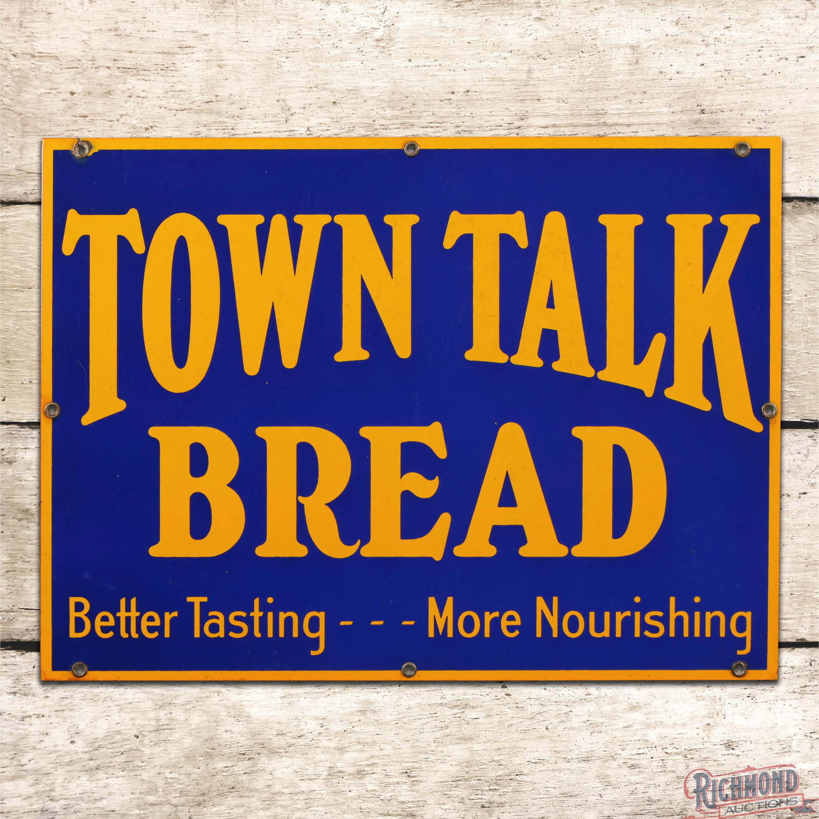 Town Talk Bread "Better Tasting More Nourishing" 19" Single Sided Porcelain Sign: SSP (single sided porcelain) sign has excellent color and gloss. The fields have light wear with fine scratches. The perimeter is very clean overall with a small chip at the upper left mounting hole. 
