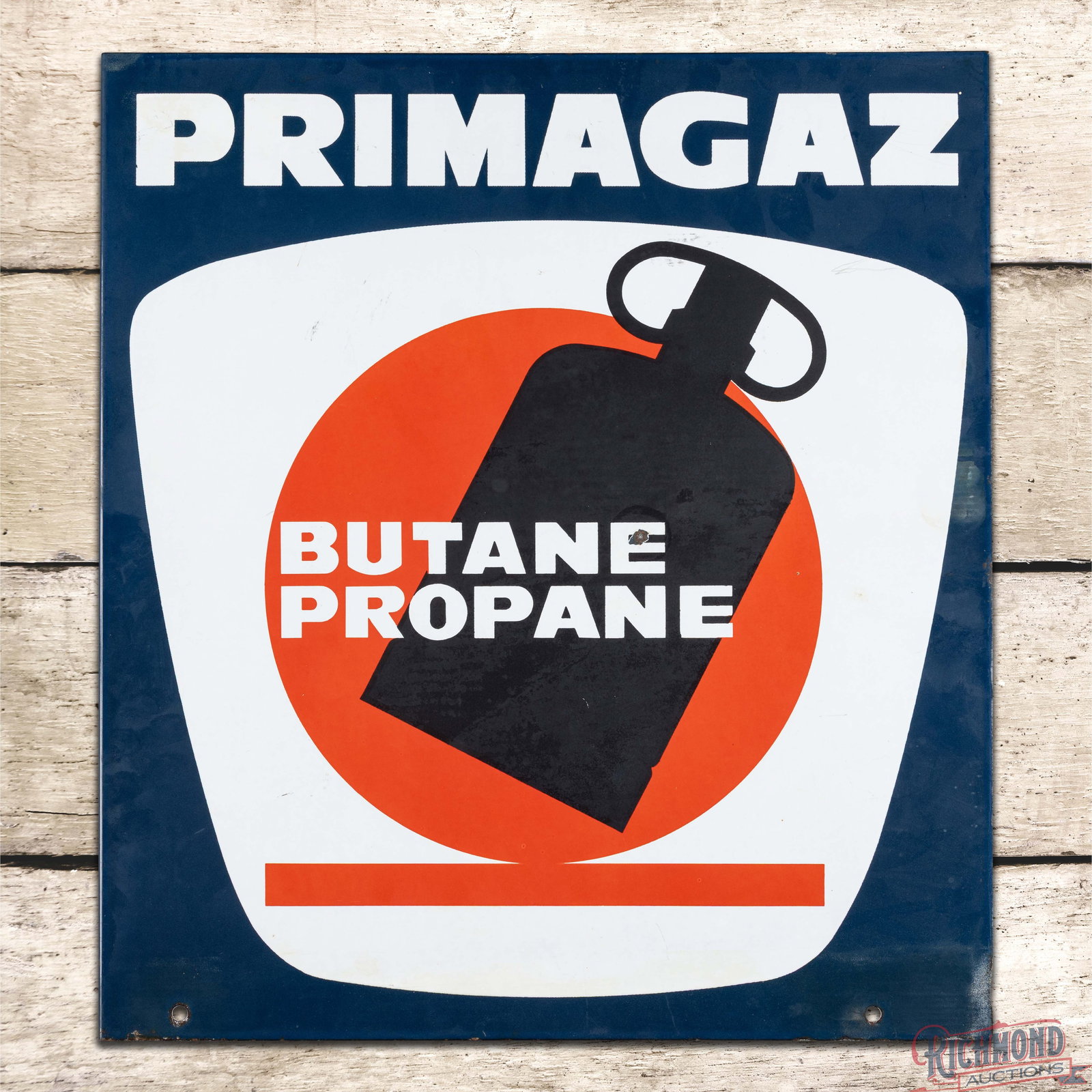 Primagaz Butane Propane Double Sided Porcelain Flange Sign: DSP (double sided porcelain) sign has good color and moderate gloss. Side #1 has light wear with slight cloudiness throughout and discoloration below the red line in the lower field. The reverse has a