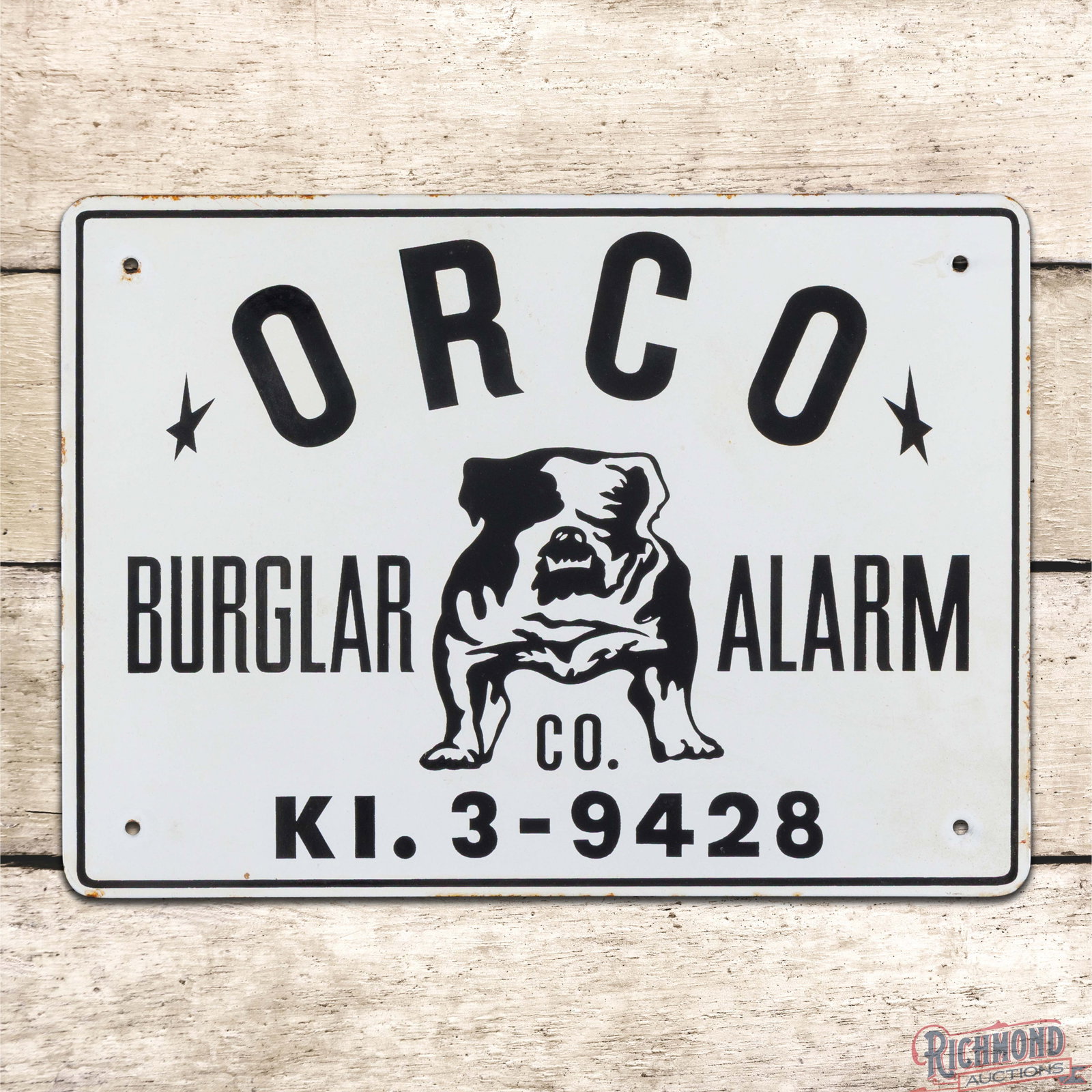 Orco Burglar Alarm Co. Single Sided Porcelain Sign w/ Bulldog: SSP (single sided porcelain) sign has excellent color and gloss. The field is very clean overall with small areas of discoloration and minor wear. The perimeter has additional discoloration along the 