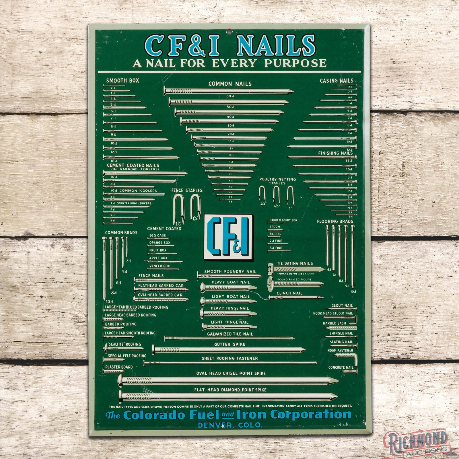 The Colorado Fuel & Iron Corp Nails Single Sided Tin Sign Denver: SST (single sided tin) crimped edge sign with cardboard reverse has excellent color and shine. The field has light wear with fine scratches and an indentation with scratch in the lower center field. T