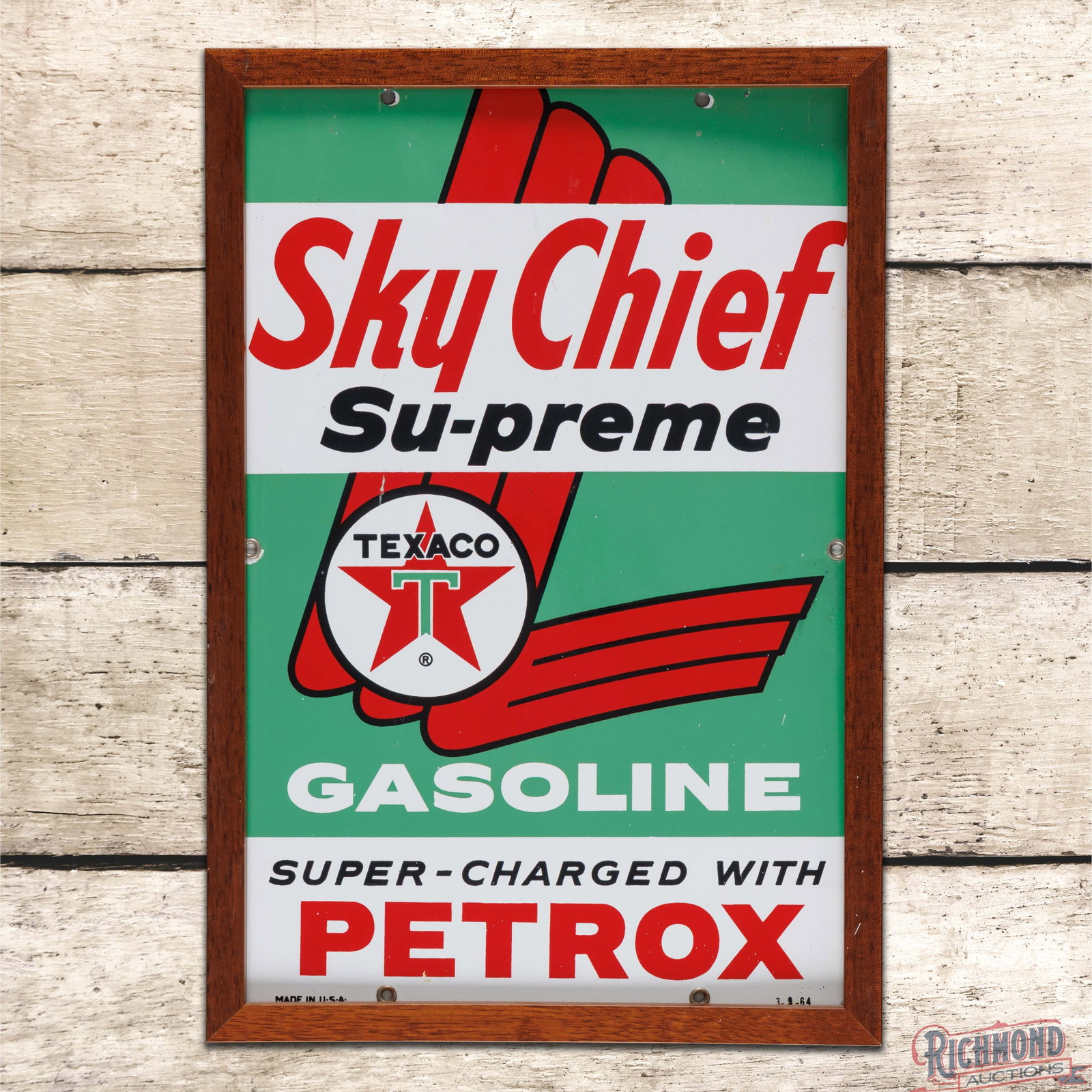 1964 Texaco Sky Chief Supreme Gasoline w/ Petrox Single Sided Porcelain Pump Plate Sign: SSP (single sided porcelain) pump plate with an added wooden frame has excellent color and gloss. The display has light surface wear with a tiny chip in the lower edge of the "E" in Petrox. The perime