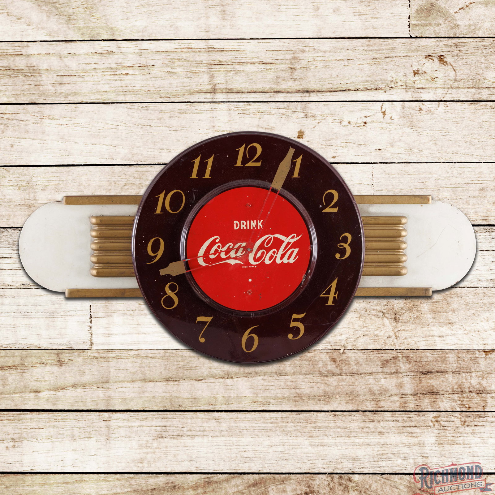 Drink Coca Cola Advertising Clock: Single sided advertising clock with a masonite attachment has good color. The clock works as it and is missing the second hand. The clock face has errant paint drips, fine scratches and small paint ch