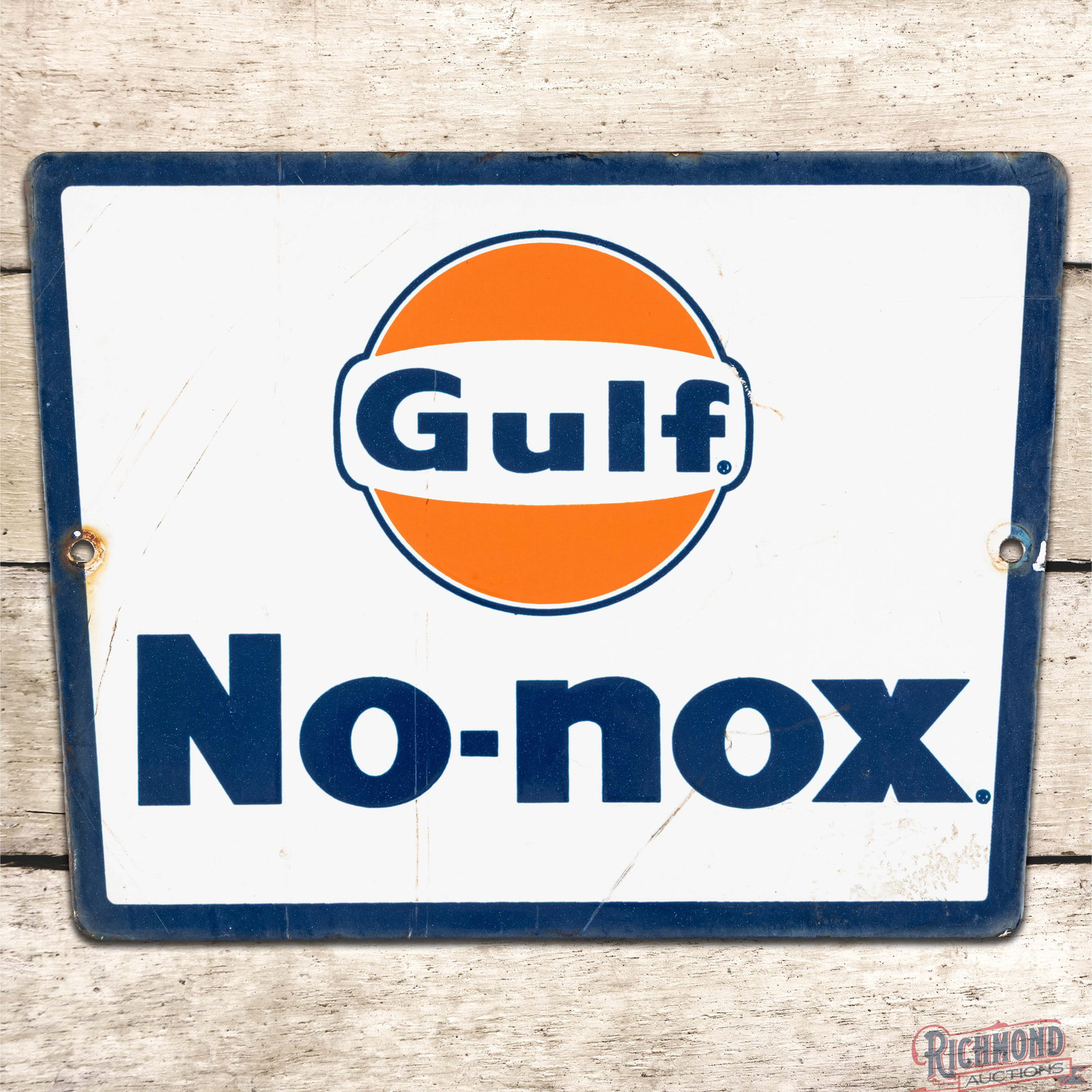 Gulf No-Nox Gasoline Single Sided Porcelain Pump Plate Sign w/ Logo: SSP (single sided porcelain) pump plate has good color and gloss. The field has fine scratches in the fields. The perimeter has discoloration at the mounting holes with small chips on the outer right 