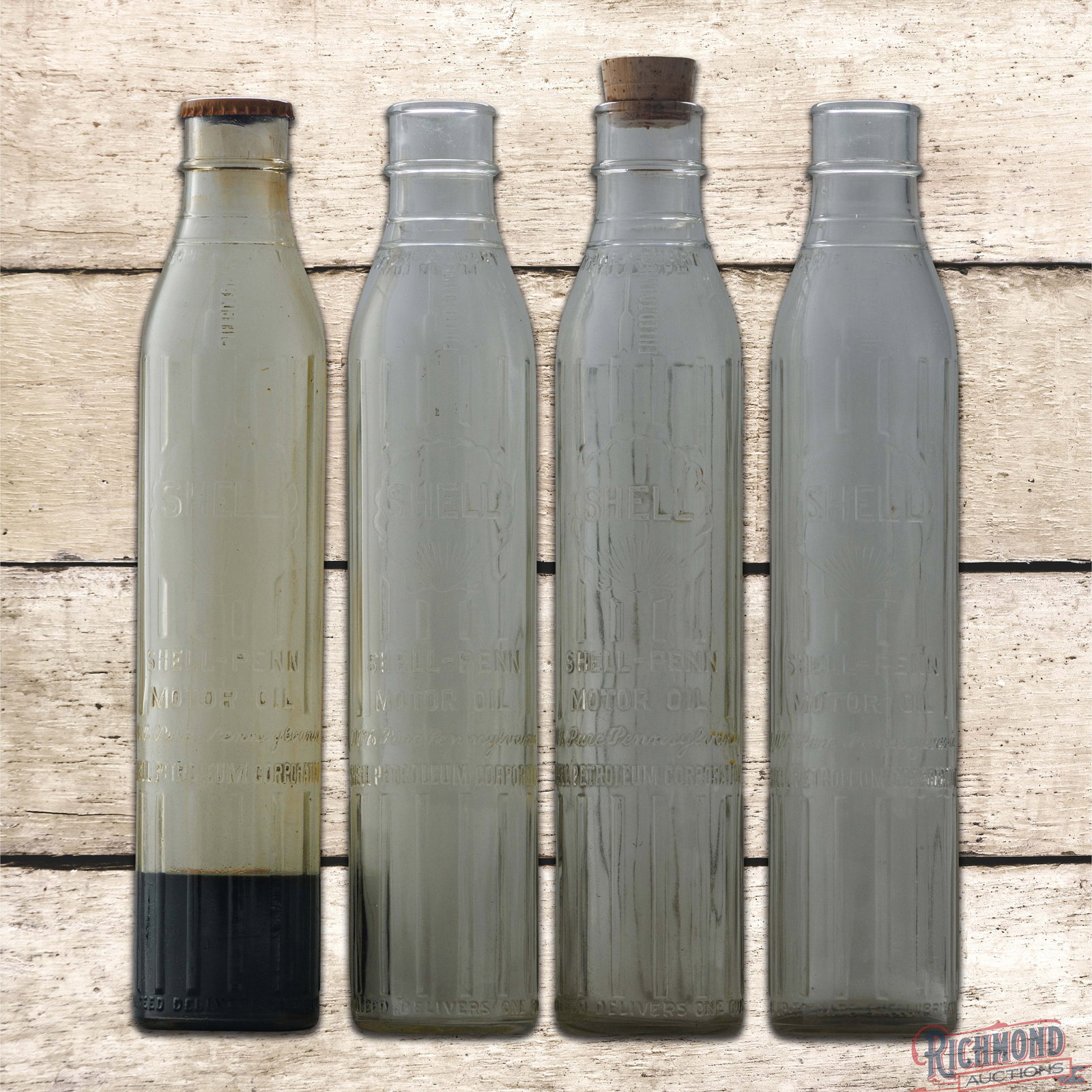 Group of Four Embossed Shell Penn Motor Oil Quart Bottles w/ Logos (1 of 5)