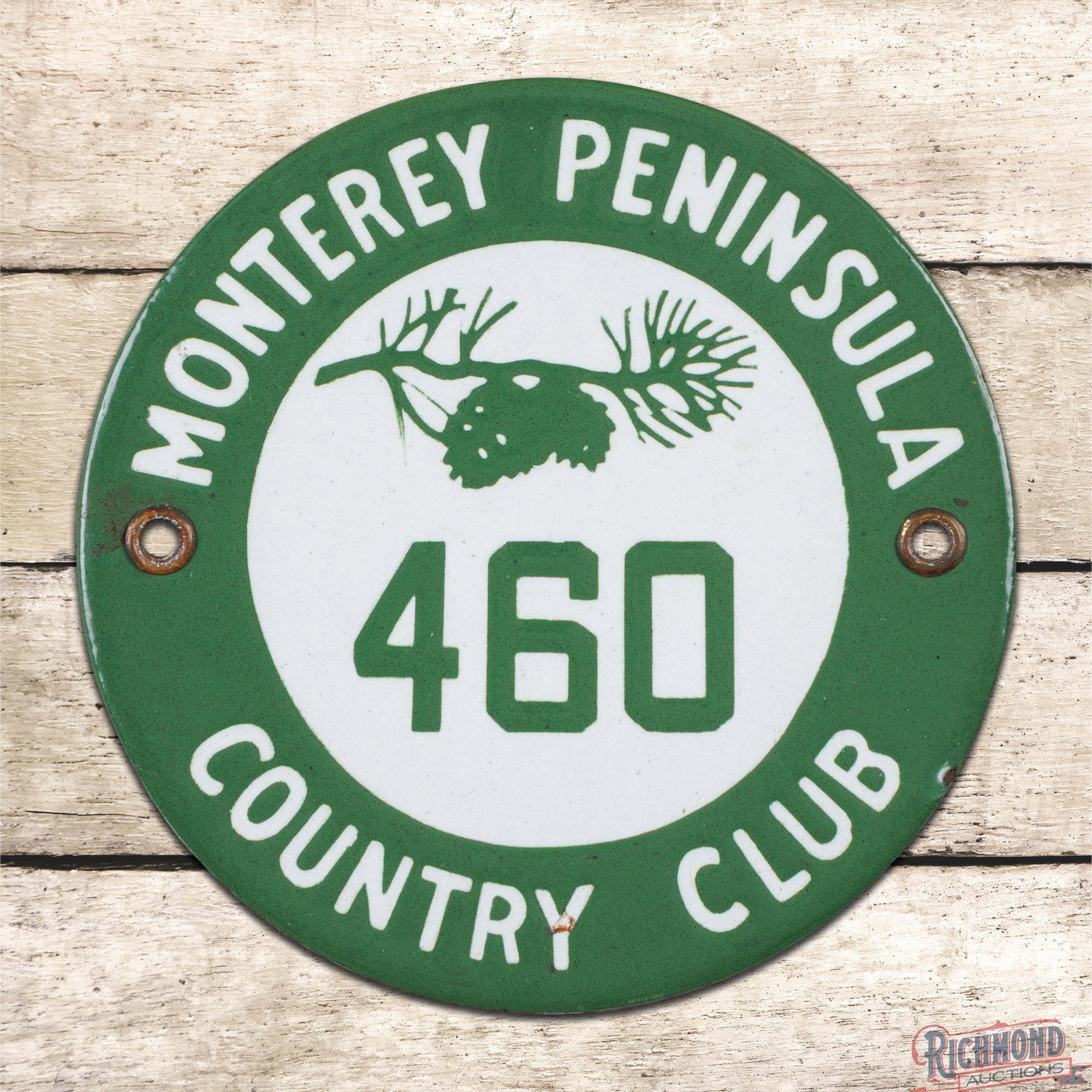 Monterey Peninsula Country Club 460 4" Single Sided Porcelain Automobile Badge Sign California: SSP (single sided porcelain) sign has excellent color and gloss. The field is clean with a tiny blemish in the "Y" of Country. The perimeter has a tiny chip on the lower right edge and both factory gr