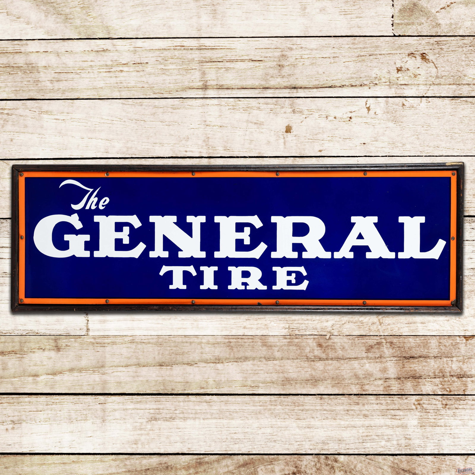 The General Tire 5' Single Sided Porcelain Sign w/ Wooden Frame: Amazing SSP (single sided porcelain) sign with the factory wooden frame has excellent color and gloss. The sign has a clean field with tiny factory blemishes in the lettering. The perimeter has minor 