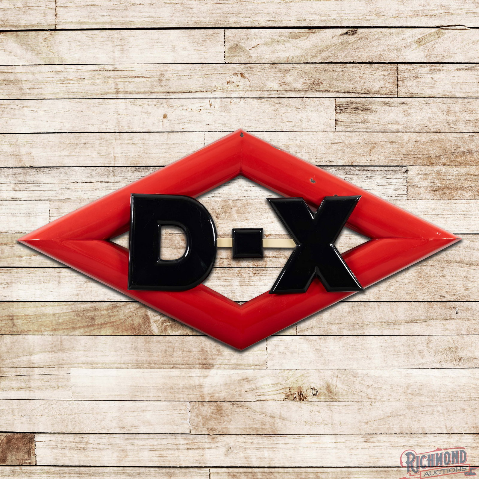 DX Gasoline Convex 3D 7' Logo Sign: SSP (single sided porcelain) three-dimensional convex die cut sign has excellent color and gloss. The field has light surface wear with two tiny chips on the edge of the "D". The perimeter has chips a