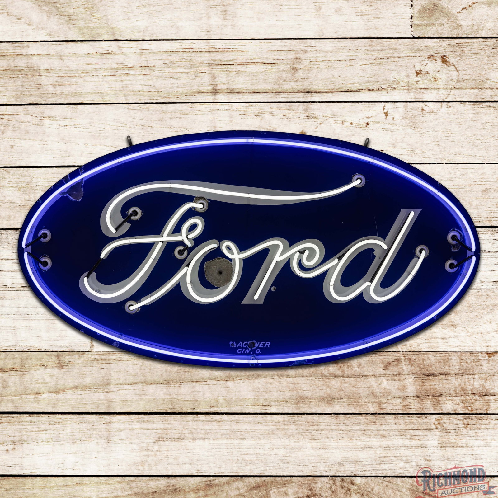 Ford Automobiles 6' Single Sided Porcelain Factory Neon Sign: SSP (single sided porcelain) factory neon sign with a metal can has good color and gloss. The sign features brilliant blue and white neon. The field has a large chip with a non-factory hole in the "O"
