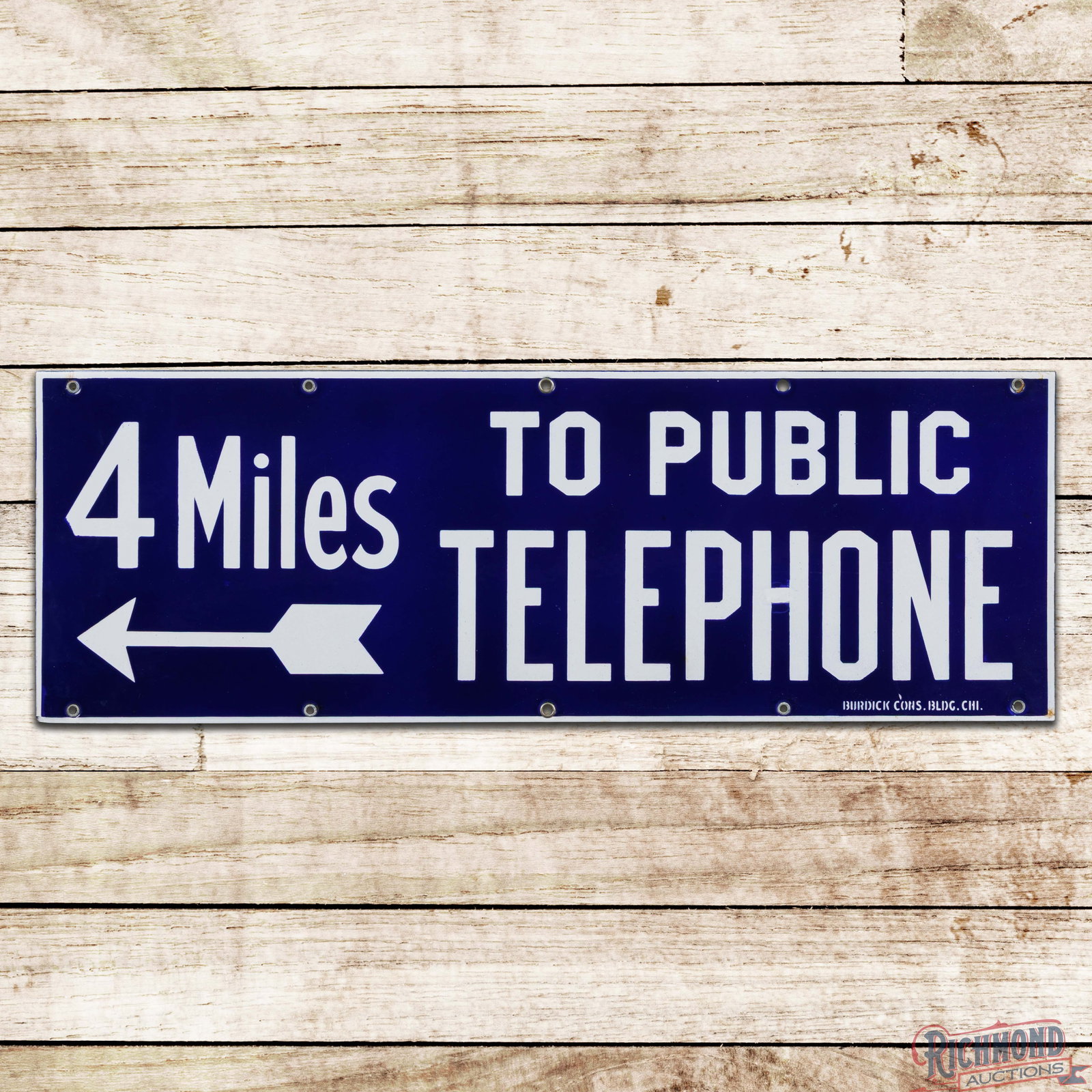 4 Miles to Public Telephone 26" Single Sided Porcelain Sign w/ Arrow: SSP (single sided porcelain) sign has outstanding color and gloss. The field is clean with minor surface imperfections. The perimeter has a small nick above the manufacturer mark with two tiny areas o