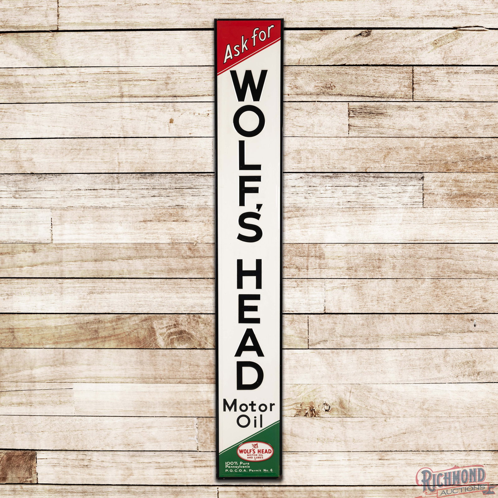 1950 Ask for Wolf's Head Motor Oil 7' Emb. Single Sided Tin Sign: SST (single sided tin) embossed self-framed sign with the factory wooden frame has outstanding color and shine. The fields are very clean overall showing only minor surface imperfections. The perimete
