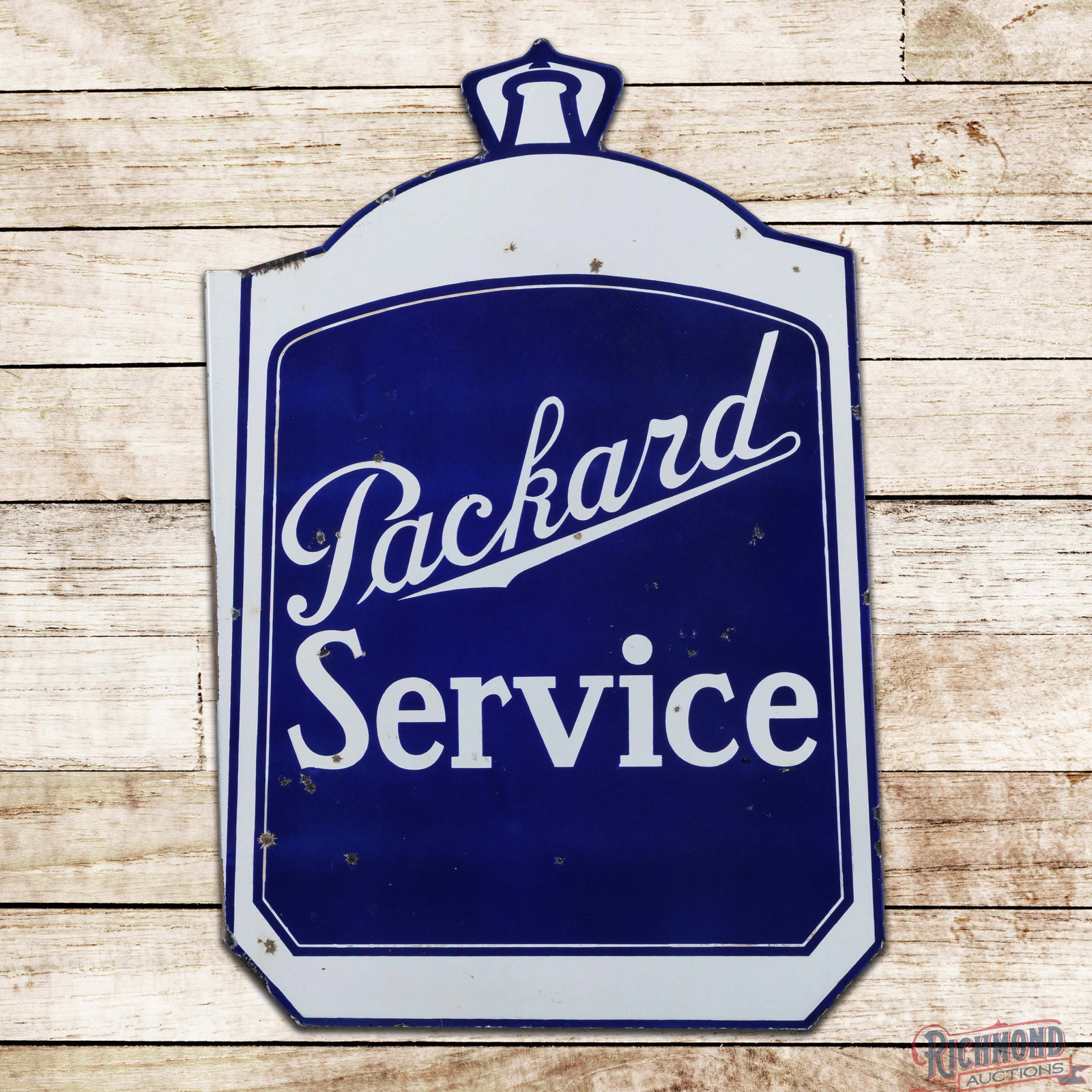 Packard Service Die Cut Double Sided Porcelain Flange Sign: DSP (double sided porcelain) die cut radiator shaped flange has very good color and gloss. The display has small chips in the fields with additional chips and minor crazing along the edges. The revers