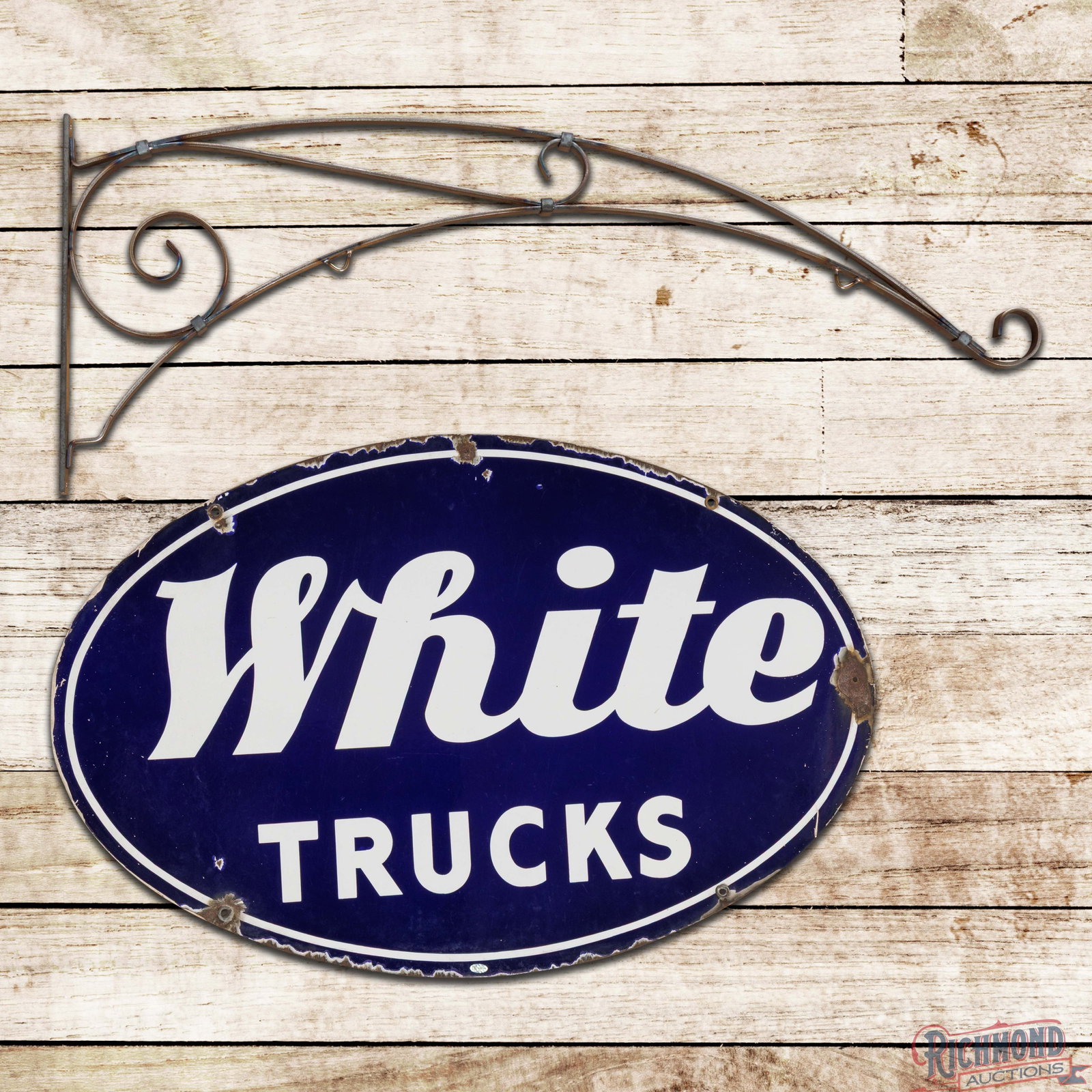 White Trucks 36" Double Sided Porcelain Oval Sign w/ Hanging Bracket: DSP (double sided porcelain) sign with a metal hanging bracket has excellent color and gloss. The field is clean. The perimeter has an added hole on the upper and right hand edges with chips and erran