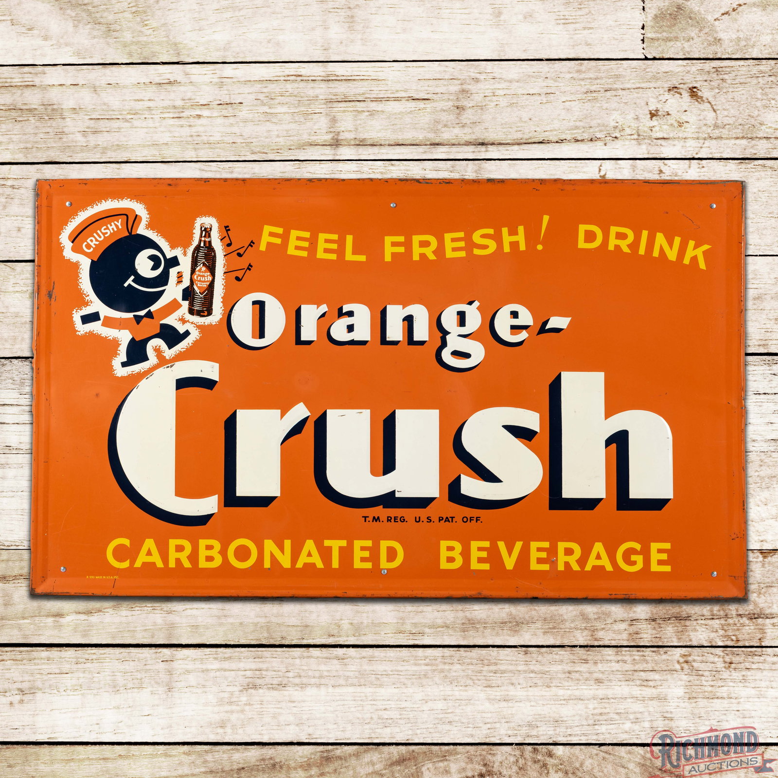 Feel Fresh! Drink Orange Crush Carbonated Beverage 5' Emb Tin Sign w/ Crushy & Krinkle Bottle: SST (single sided tin) embossed sign has very good color and shine. The sign features a large Crushy graphic with a krinkle bottle and music notes in the left field. The display has small scratches, p