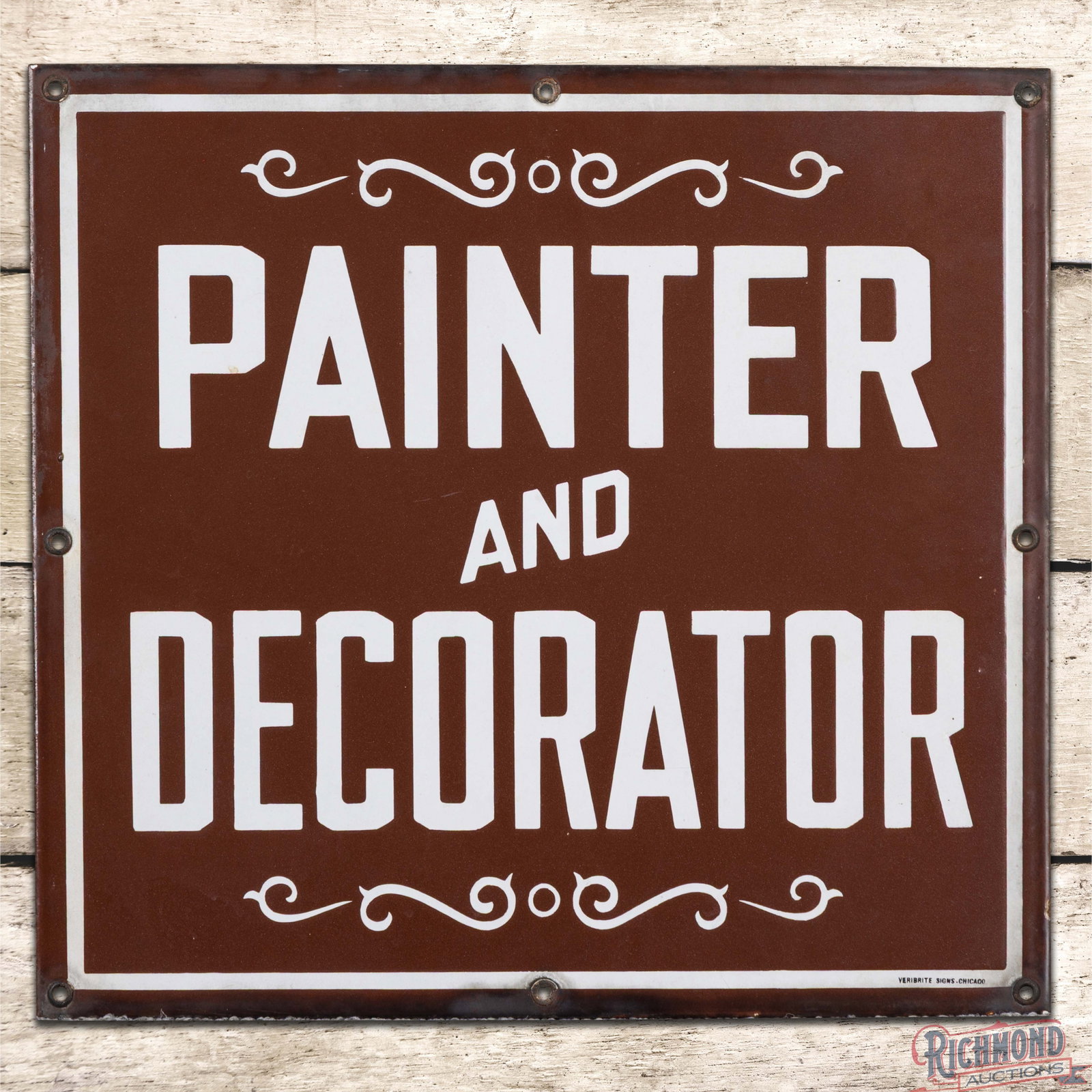 Painter and Decorator 14" Single Sided Porcelain Sign: SSP (single sided porcelain) sign has excellent color and gloss. The field is clean. The perimeter has areas of discoloration and a few tiny flea bites along the outer edges. All eight factory grommet