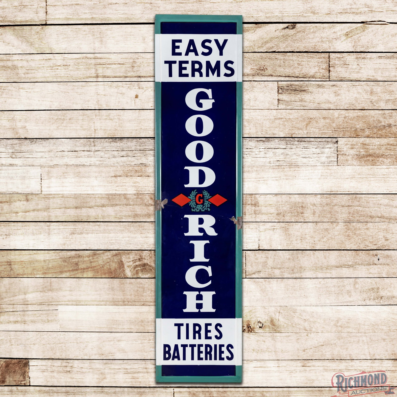 Goodrich Easy Terms Tires Batteries 6.5' Single Sided Porcelain Sign w/ Logo: SSP (single sided porcelain) self-framed sign has excellent color and gloss. The field has a faint bend below the logo with crazing and chips, which correspond to the larger chips on the outer edges. 