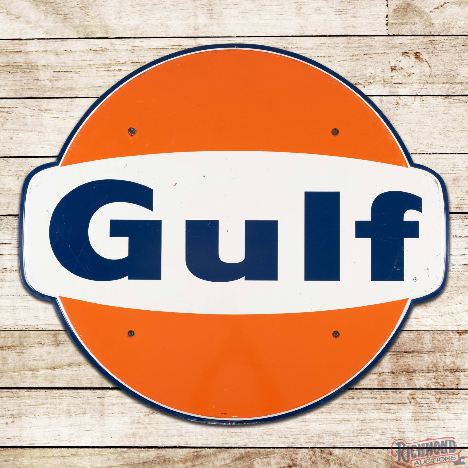 1966 Gulf Service Station 42" Single Sided Tin Logo Sign: SST (single sided tin) self-framed sign has very good color and shine. The field exhibits light wear with fine scratches and small paint chips. The perimeter has similar wear with minor oxidation alon