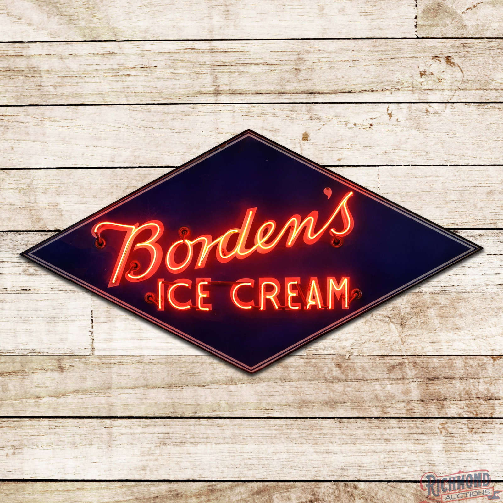 Borden's Ice Cream 6' Single Sided Porcelain Factory Neon Sign: SSP (single sided porcelain) factory neon sign with metal can has excellent color and gloss. The display has a clean field with minor wear at the neon supports and a tiny flea bite in the upper outer 