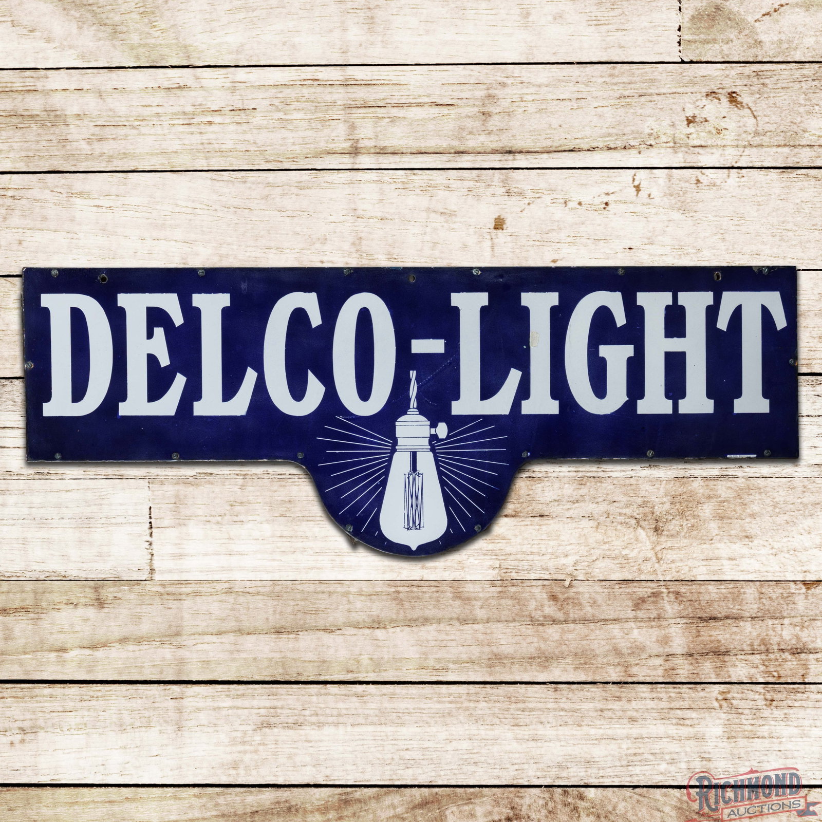 Rare Delco-Light 48" Die Cut Single Sided Porcelain Sign w/ Light Bulb: SSP (single sided porcelain) die cut sign with a wooden support frame has very good color and gloss. The sign features a large bulb graphic in the lower field with classic blue and white porcelain ena