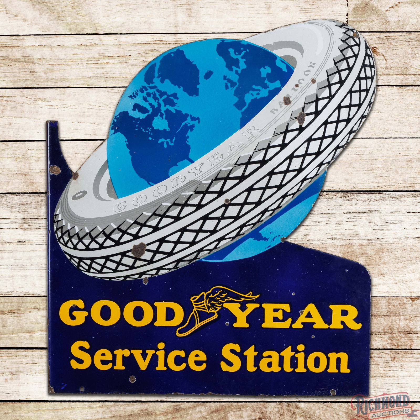 Goodyear Service Station Double Sided Porcelain Flange Sign w/ World & Tire: DSP (double sided porcelain) die cut flange has very good color and gloss. The display has light wear with small chips and areas of discoloration in the upper left fields. The perimeter is comparable 