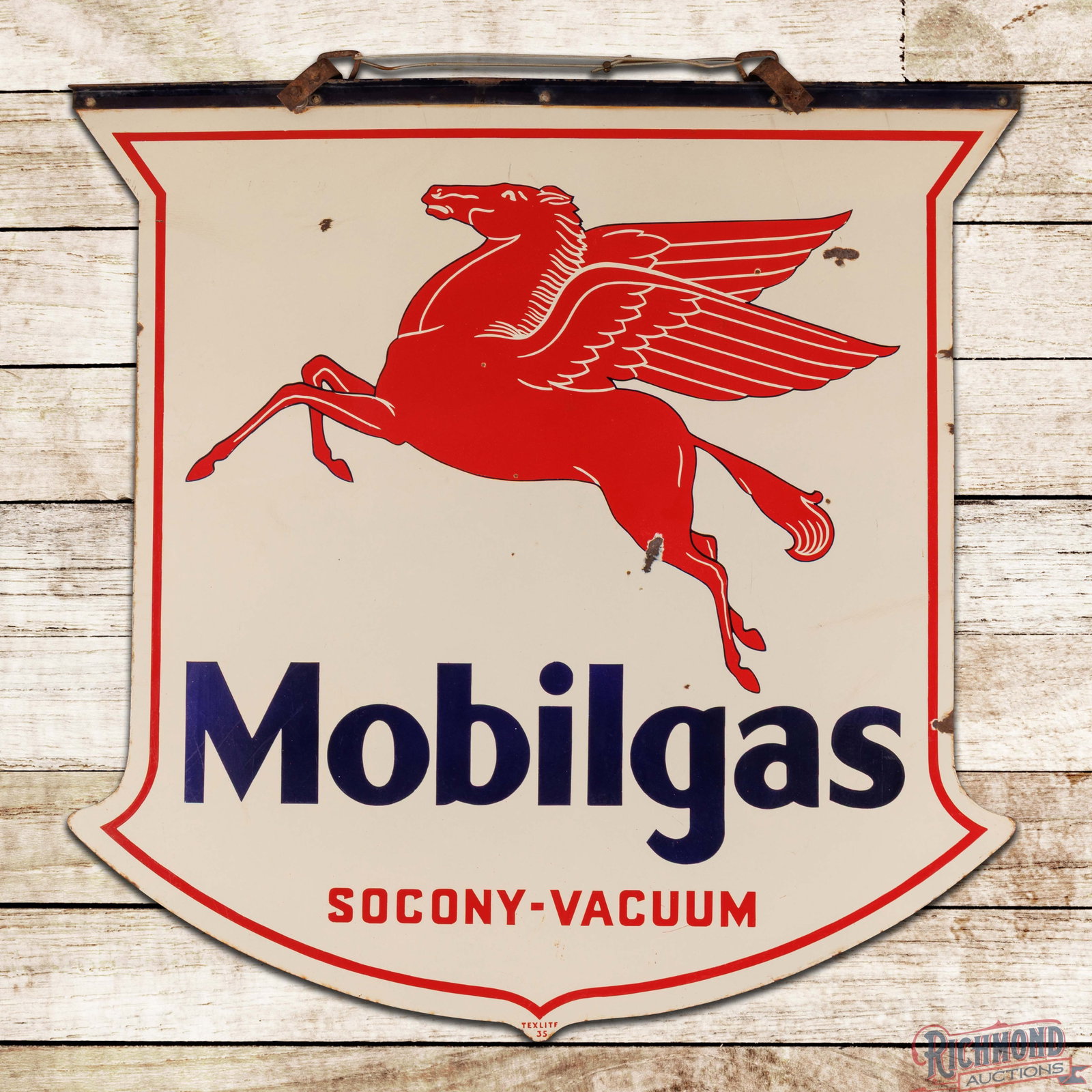 1935 Mobilgas Socony-Vacuum Double Sided Porcelain Sign w/ Pegasus: DSP (double sided porcelain) die cut sign has very good color and gloss. Side #1 presents with chips, light wear and small areas of crazing in the outer fields. The perimeter has chips with areas of c