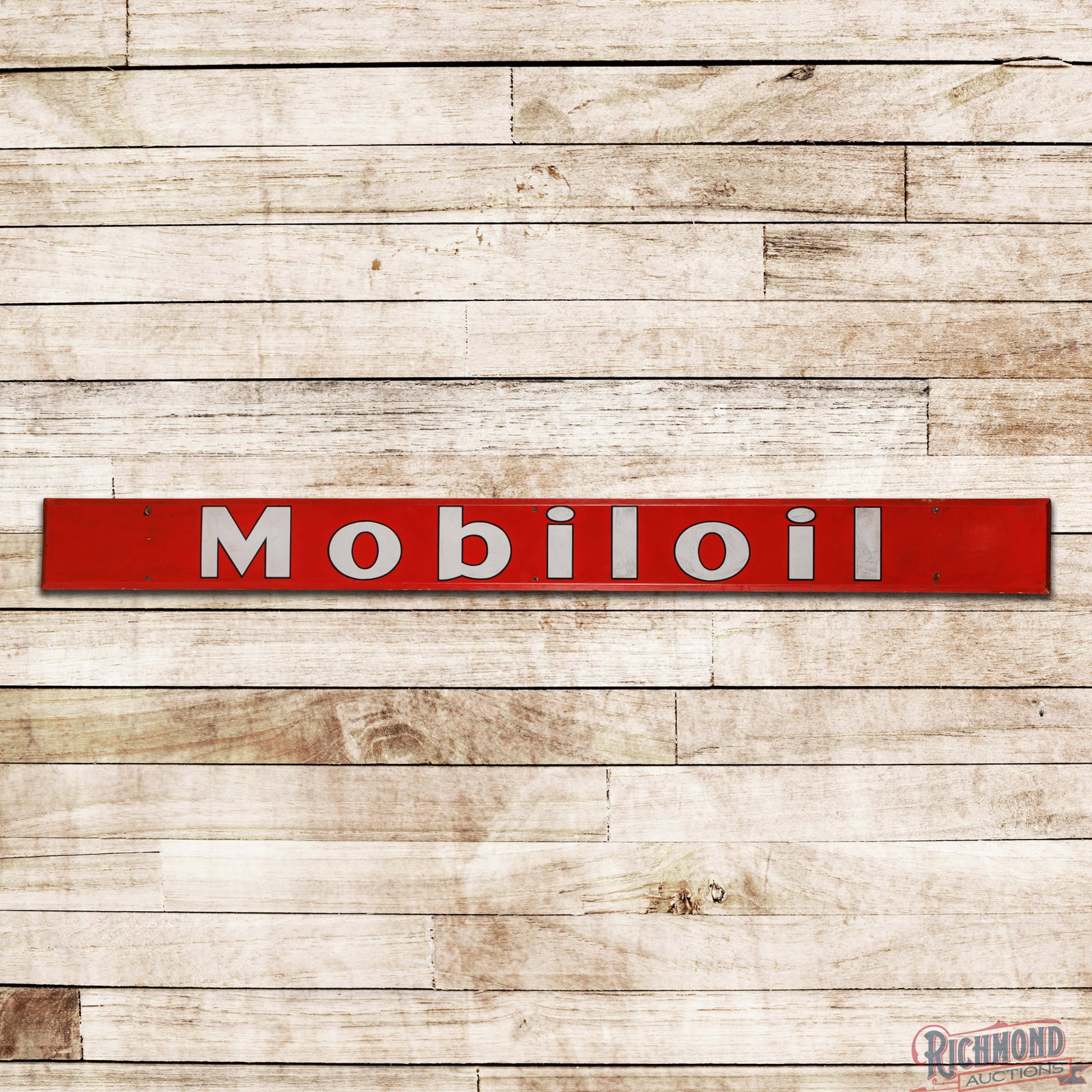 Mobiloil Service Station Horizontal 9' Single Sided Porcelain Sign: SSP (single sided porcelain) rolled edge sign has good color and gloss. The field s have fine scratches with areas of discoloration and buff marks throughout. The perimeter has chips at the mounting h