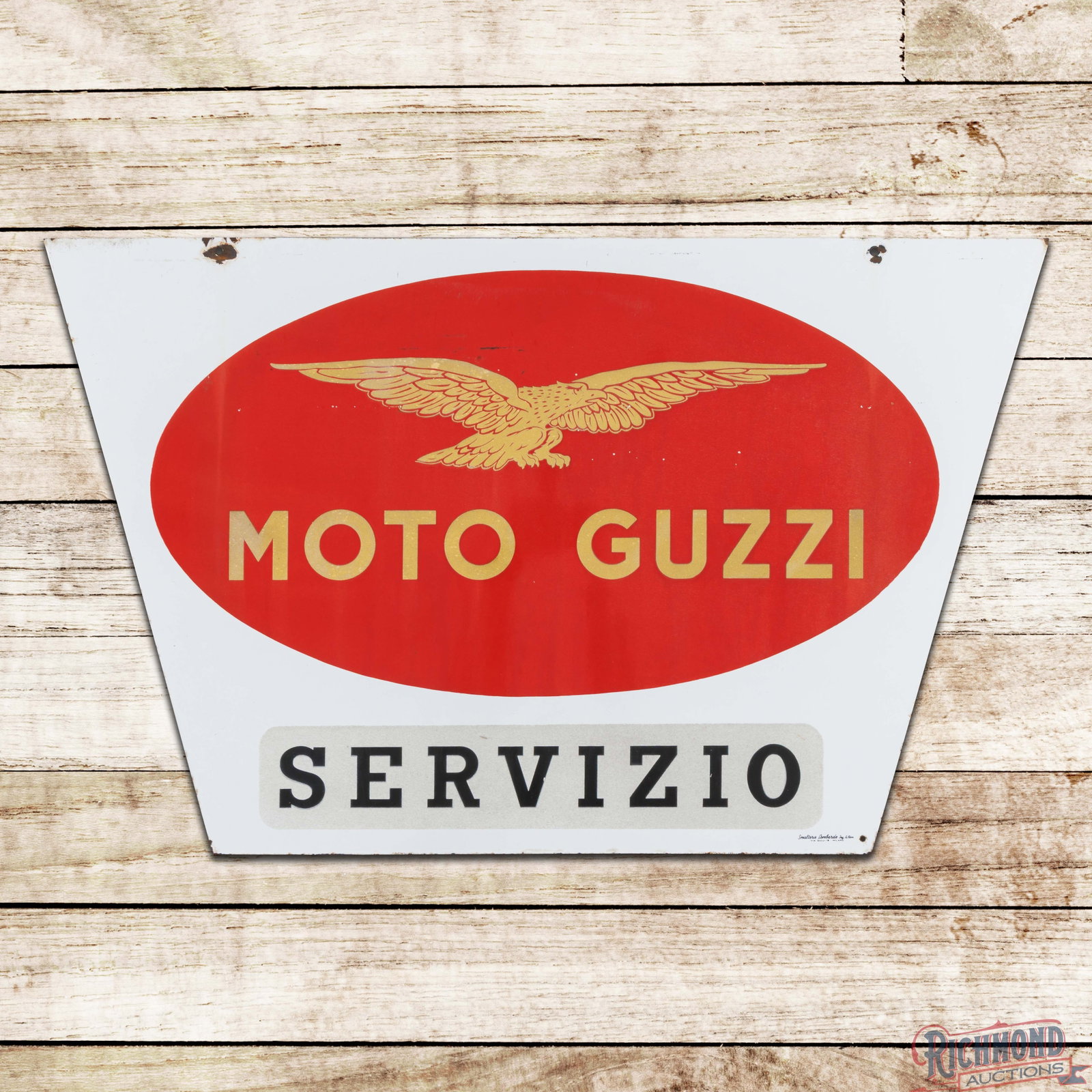Moto Guzzi Motorcycles Servizio Double Sided Porcelain Reflective Sign w/ Logo: DSP (double sided porcelain) die cut sign with reflective logo and lettering has excellent color and gloss. The display has tiny flea bites in the fields with areas of slight discoloration in the red 