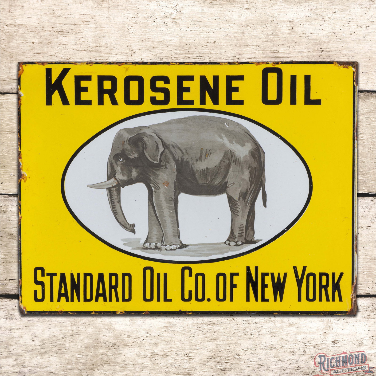 Standard Oil Co. of New York Kerosene Double Sided Porcelain Flange w/ Elephant: DSP (double sided porcelain) flange has excellent color and gloss. Side #1 has light wear with small factory blemishes and dime sized arear of discoloration in the graphic. The perimeter has chips wit