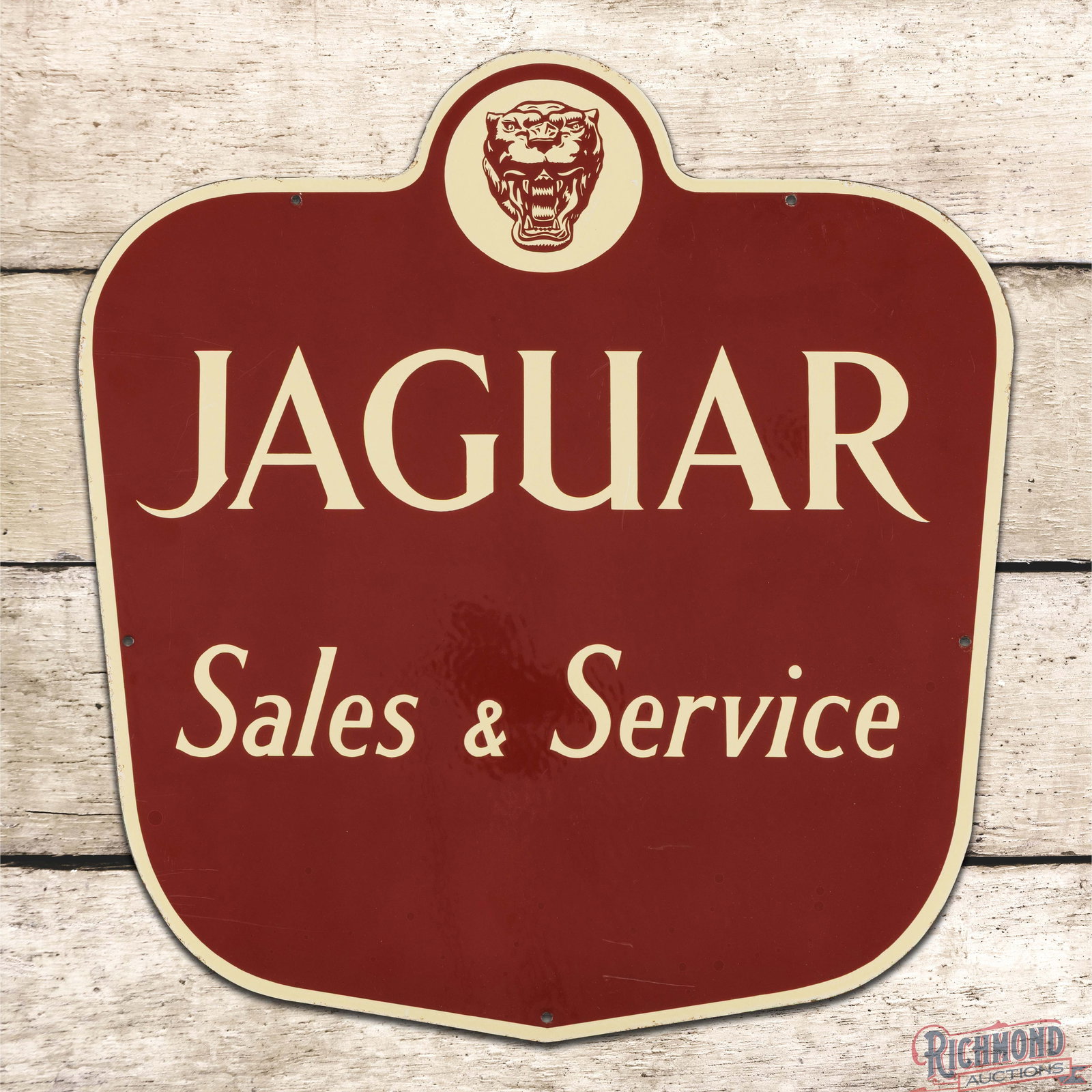 Jaguar Sales & Service Die Cut 20" Single Sided Porcelain Logo Sign "Small": SSP (single sided porcelain) die cut sign has excellent color and gloss. The field is very clean overall with light wear and fine scratches that are primarily in the outer fields. The perimeter exhibi