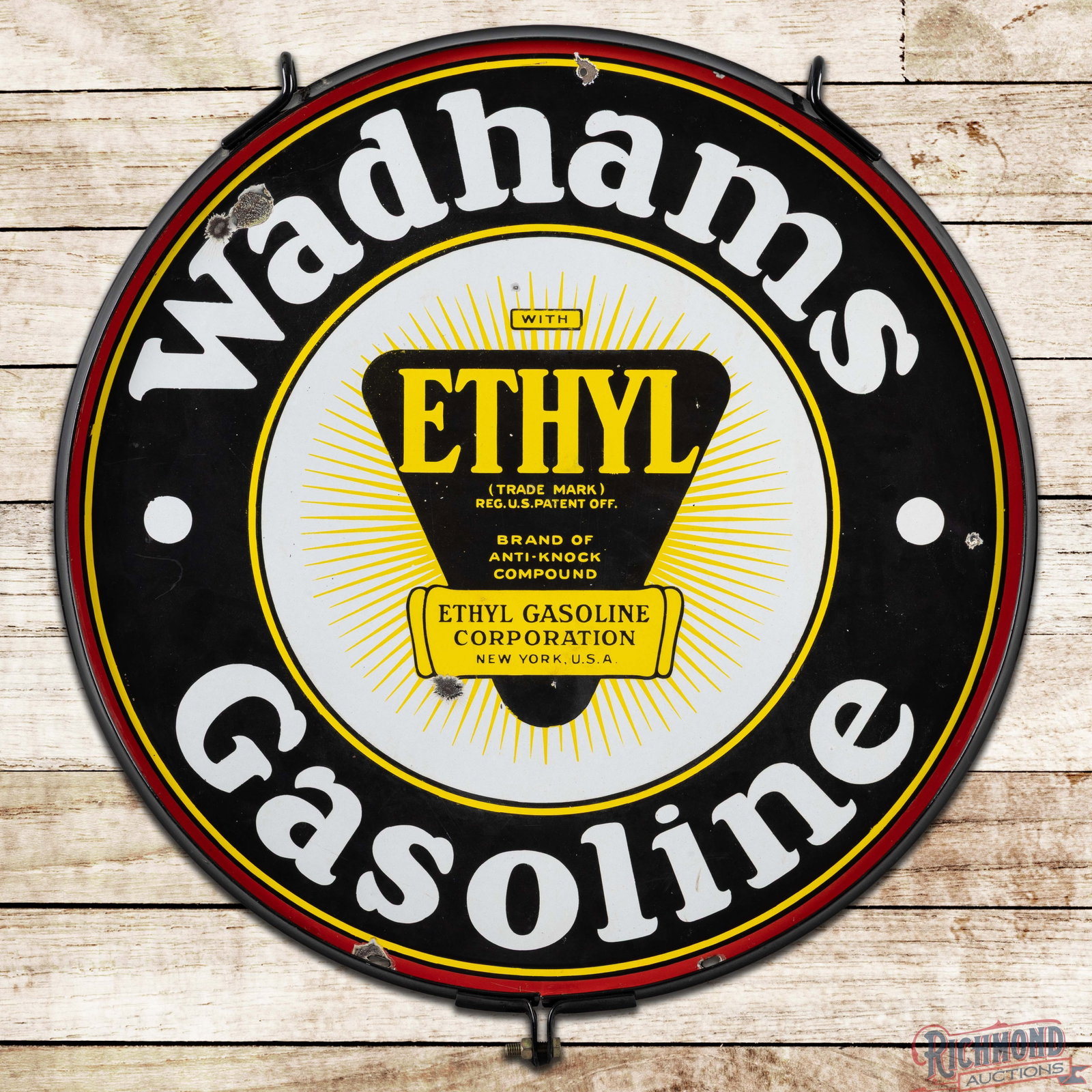Wadhams Ethyl Gasoline 30" Double Sided Porcelain Sign w/ Ring: DSP (double sided porcelain) sign has very good color and gloss. The display has light wear with chips and minor crazing in the fields. The perimeter has a non-factory hole at 12 o'clock with addition