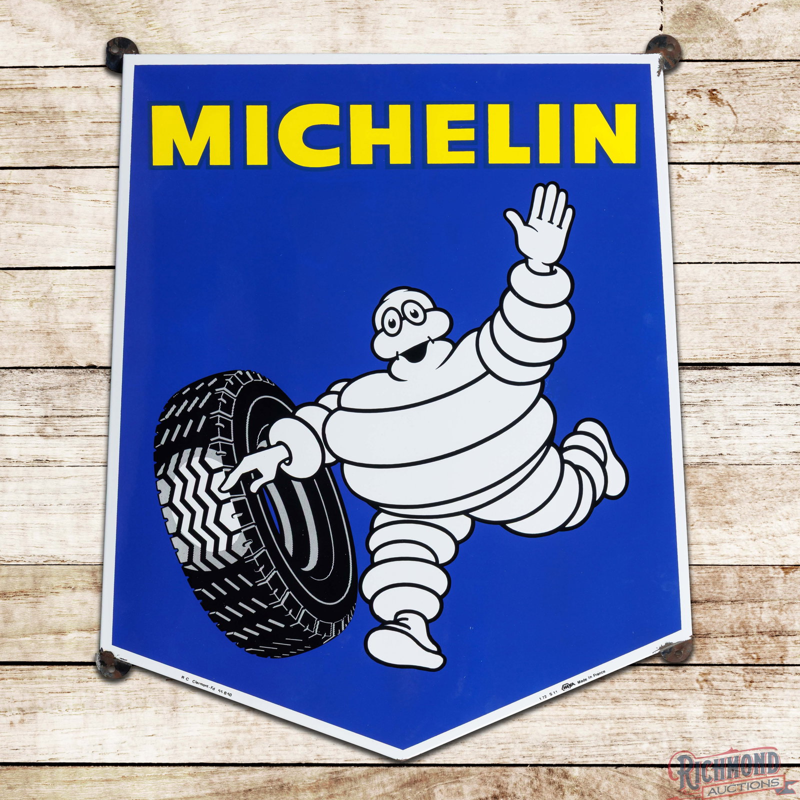 Michelin 32" Die Cut Single Sided Porcelain Sign w/ Bibendum & Tire: SSP (single sided porcelain) die-cut rolled-edge sign has excellent color and gloss. The field is clean with light wear and tiny imperfections in the outer fields. The perimeter has small chips at the
