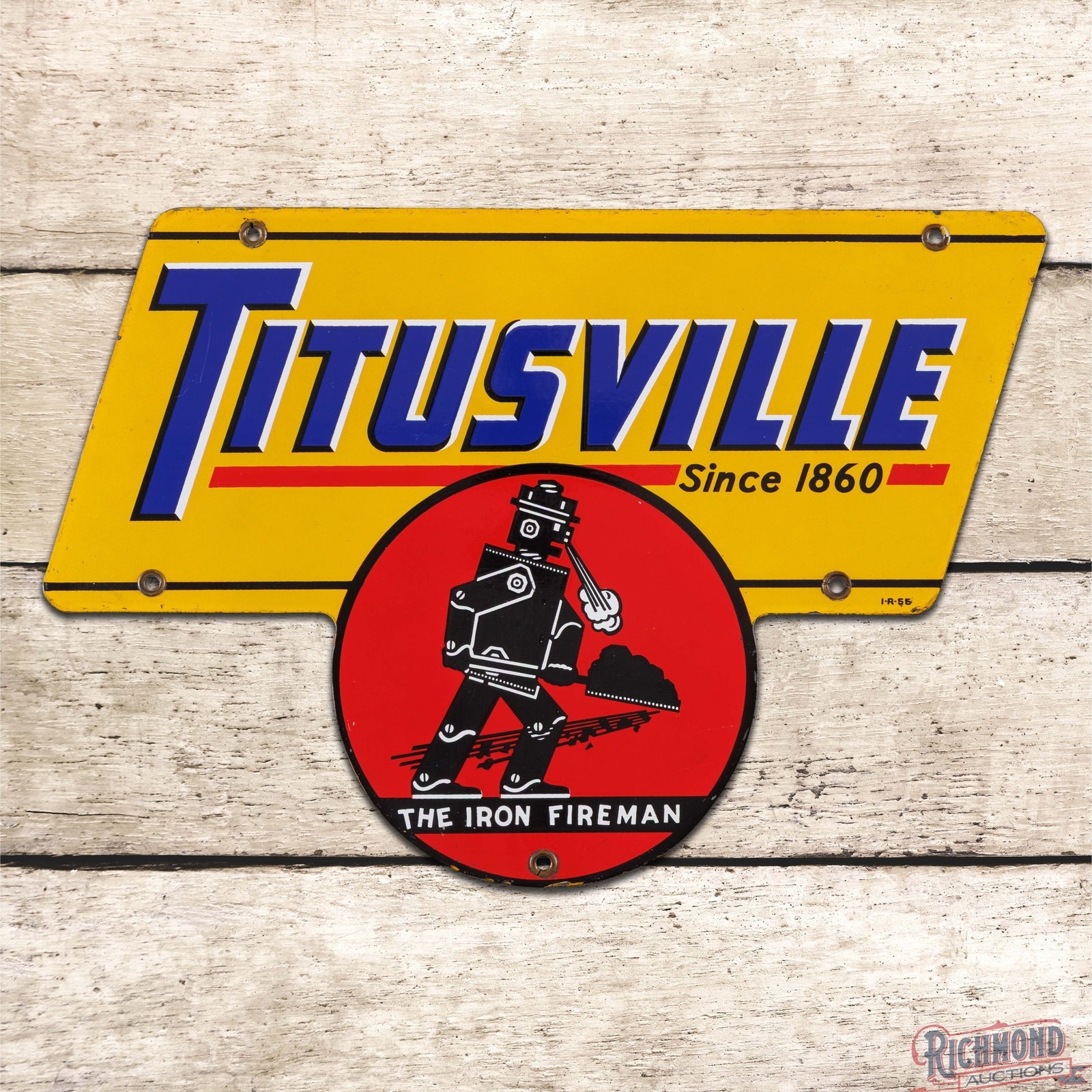 Titusville "Since 1860" The Iron Fireman Die Cut Single Sided Porcelain Sign: SSP (single sided porcelain) sign has excellent color and gloss. The field is very clean overall showing only a few fine scratches in the outer fields. The perimeter has small chips along the outer ed
