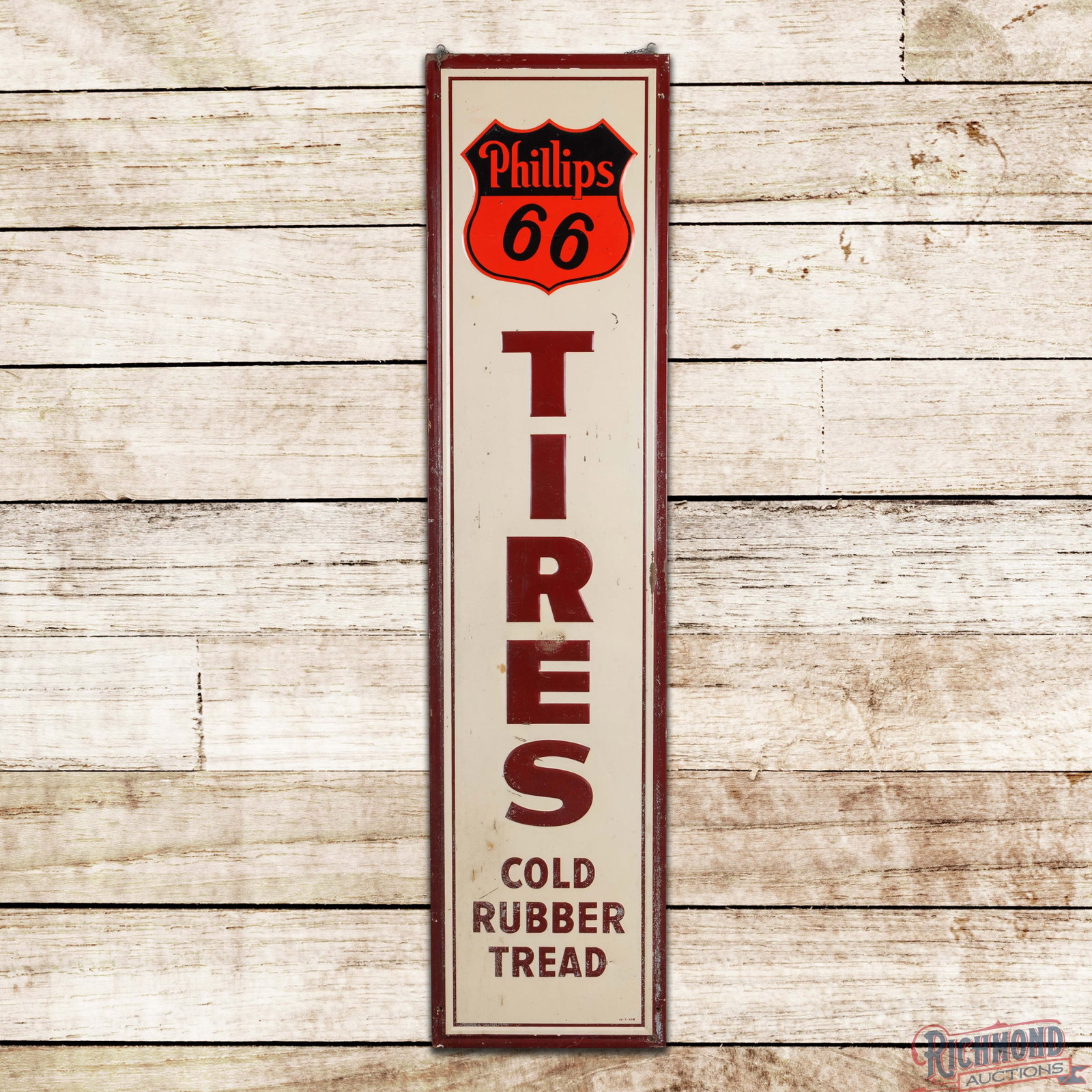 Phillips 66 Tires Cold Rubber Tread 6' Emb. Single Sided Tin Logo Sign: SST (single sided tin) embossed self-framed sign with the factory wooden frame has good color. The field exhibits general wear throughout with oxidation, paint loss and dings. The perimeter is similar