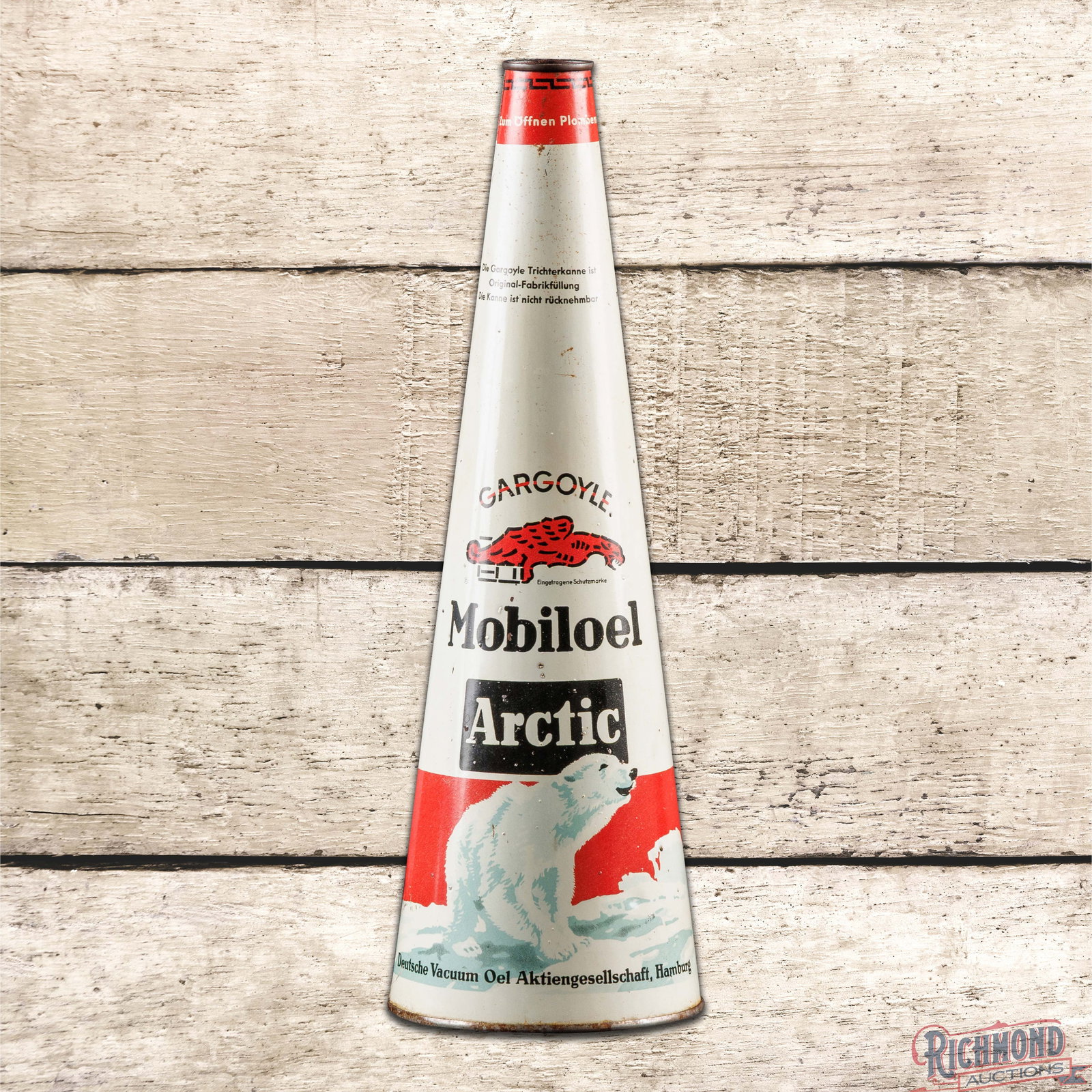 Mobil Gargoyle Arctic Motor Oil Cone Top Can w/ Polar Bear: Empty cone top can has very good color and shine. The display features colorful graphics of a large polar bear in the lower field and the iconic gargoyle in the center field. The display has light wea