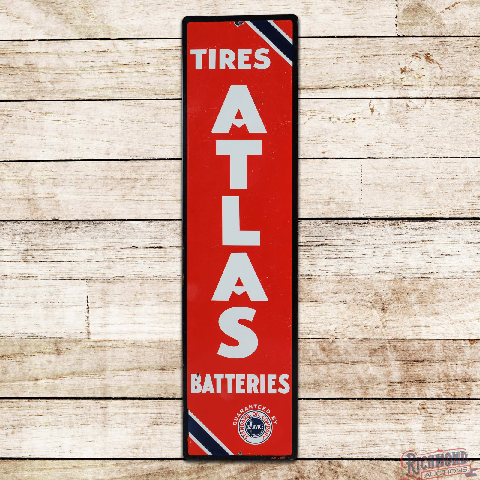 Atlas Tires Batteries Standard Oil Company 5' Single Sided Porcelain Sign: SSP (single sided porcelain) rolled edge sign has good color and gloss. The field has surface wear with fine scratches, minor discoloration near the "A" and an added hole above the "B" in Batteries. T