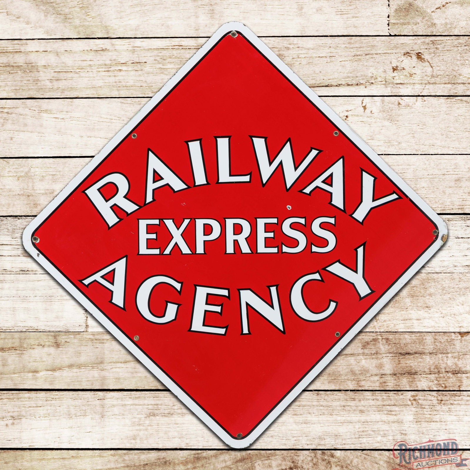 Railway Express Agency 4' Single Sided Porcelain Sign: SSP (single sided porcelain) sign has excellent color and gloss. The display has a dime-sized chip with other small scuffs and light wear. The perimeter has small chips at two of the mounting holes, o