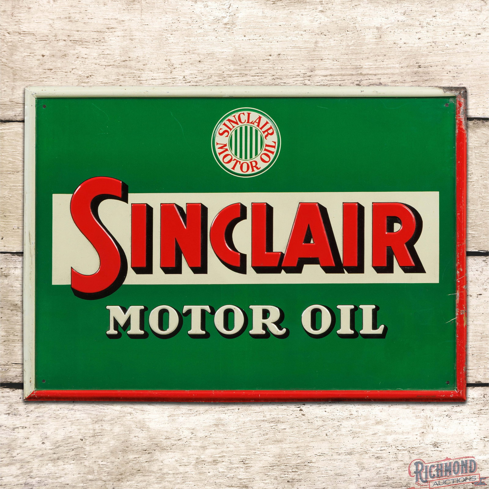 Rare Sinclair Motor Oil Emb. Single Sided Tin Sign w/ Logo: SST (single sided tin) embossed sign has excellent color and shine. The field has faint paper marks with light wear in the outer fields. The perimeter has small areas of paper residue, paint chips and