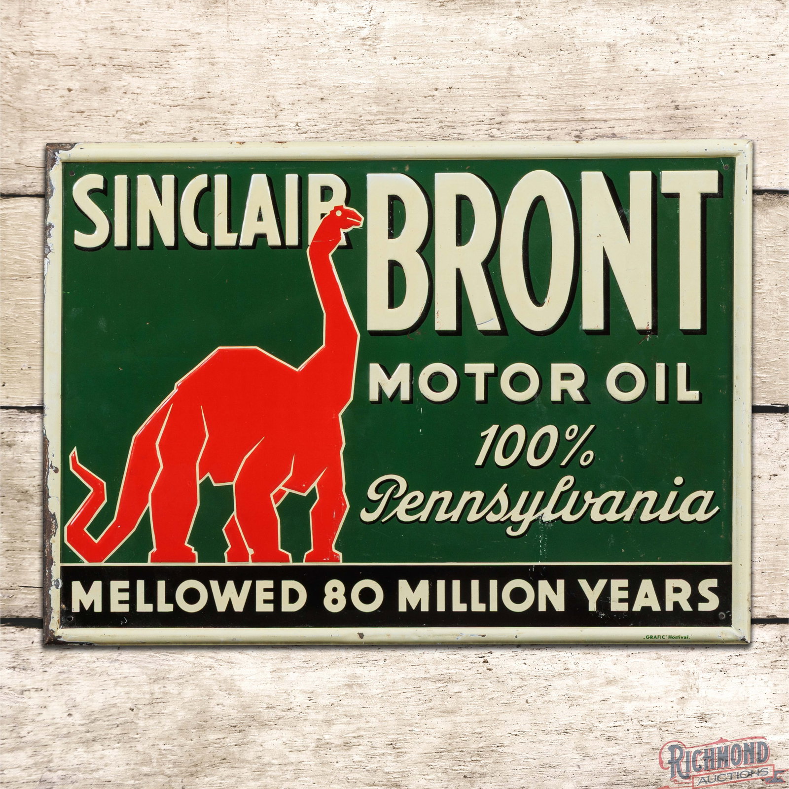 Scarce Sinclair Bront Motor Oil "Mellowed 80 Million Years" Emb Tin Sign w/ Standing Dino: SST (single sided tin) embossed self-framed sign has very good color and shine. The field has light wear with fine scratches, tiny dings and scuffs. The perimeter has areas of paint loss and wear to t