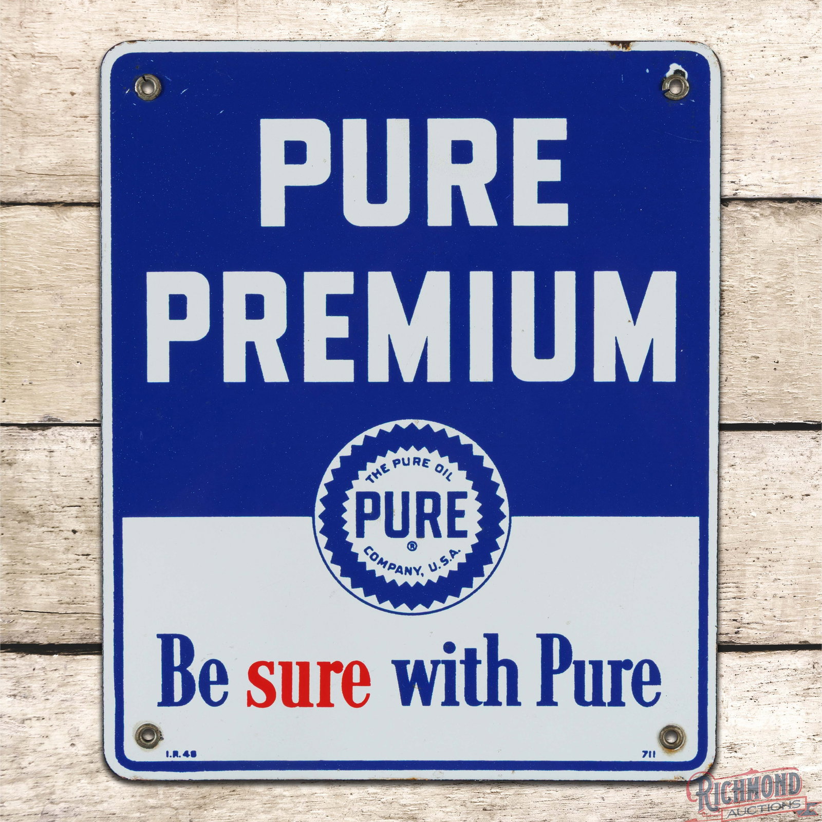 1948 Pure Premium "Be Sure With Pure" Gasoline Single Sided Porcelain Pump Plate Sign w/ Logo: SSP (single sided porcelain) sign has excellent color and gloss. The display is clean with minor spotting in the fields. The perimeter has small nicks with light wear, small chips at two mounting hole