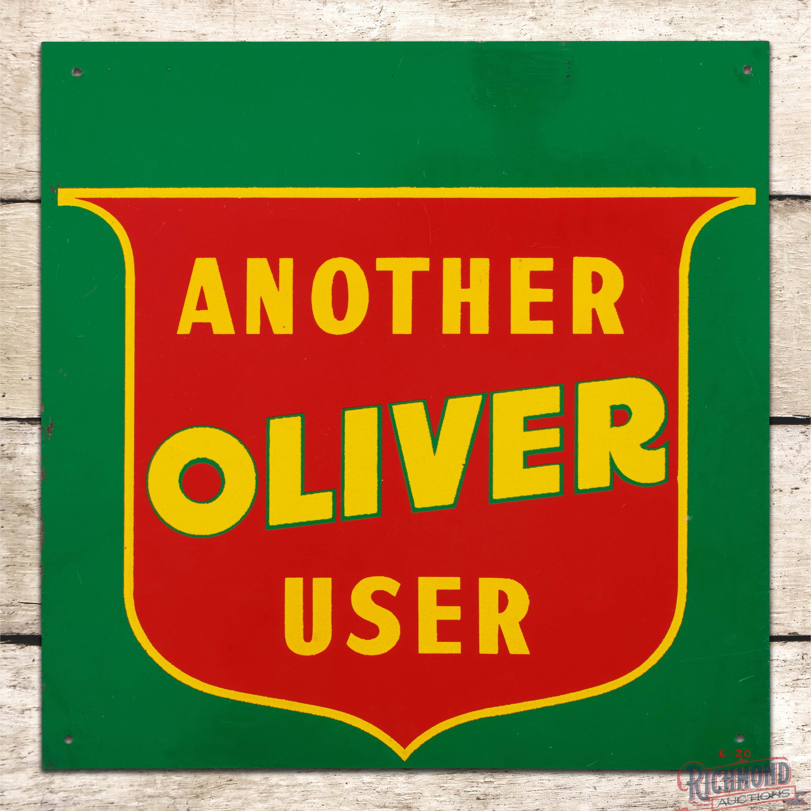 Another Oliver User "Oliver Farm Equipment" 12" Single Sided Tin Sign: SST (single sided tin) sign has excellent color and shine. The field has minor imperfections with faint paper marks and slight discoloration to the red painted logo. The perimeter has small paint chip
