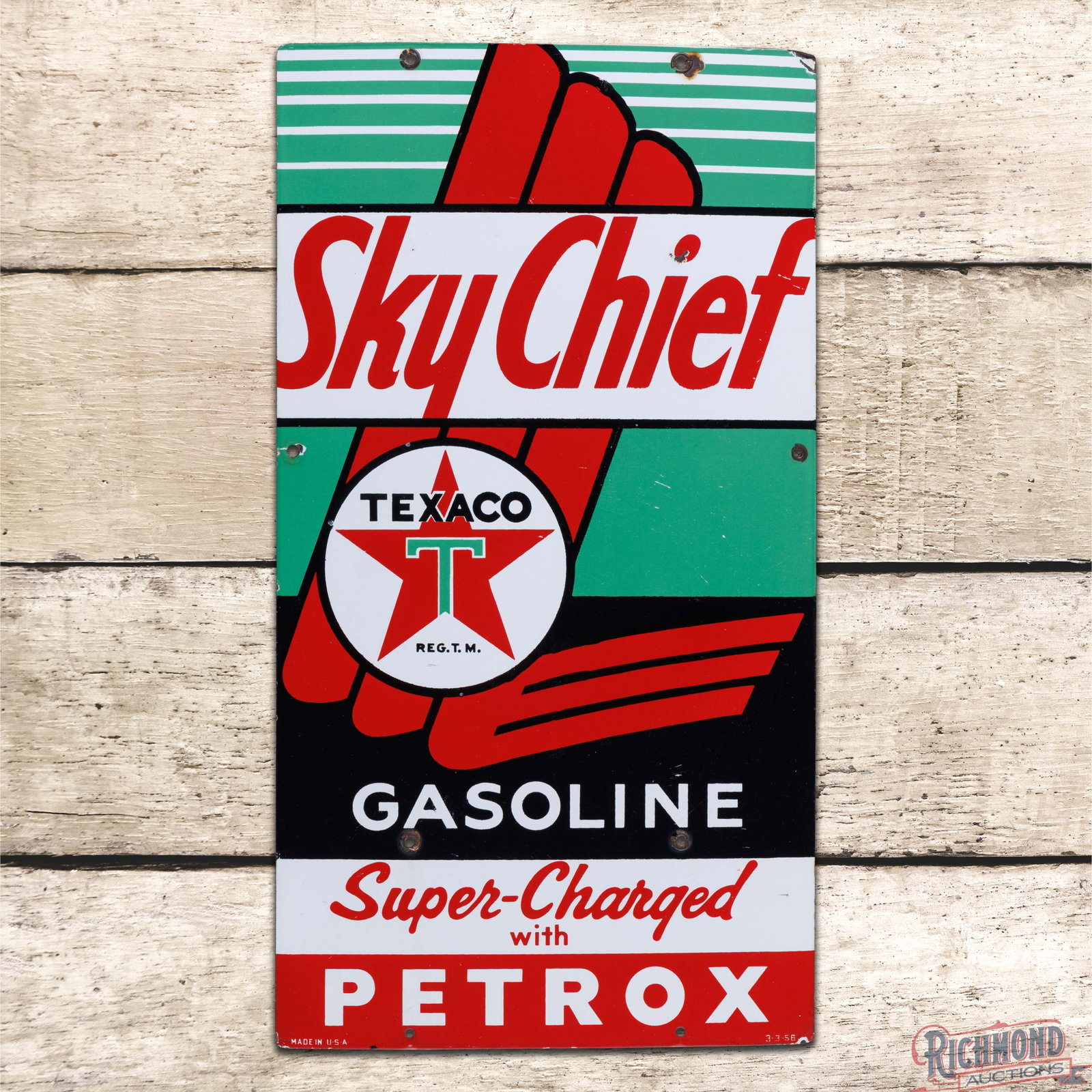 1956 Sky Chief Gasoline Super Charged w/ Petrox Single Sided Porcelain Pump Plate Sign "Large": SSP (single sided porcelain) sign has very good color and gloss. The field has fine scratches with light wear and small chips. The perimeter has additional small chips with a minor bend on the upper r