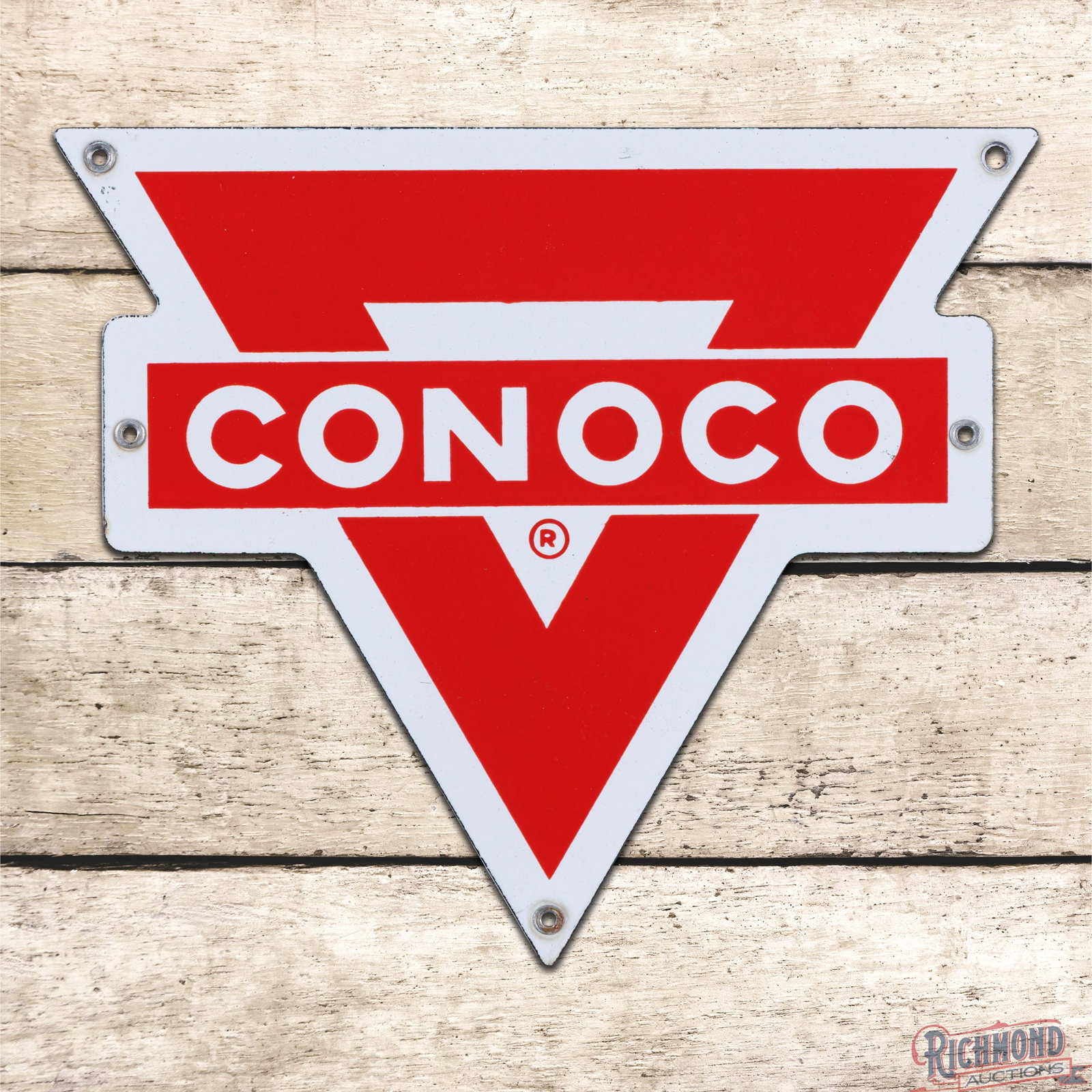 Conoco Motor Oils Die Cut Single Sided Porcelain Sign: SSP (single sided porcelain) die cut sign has excellent color and gloss. The field is clean. The perimeter has areas of minor discoloration and a tiny flea bite on the left hand edge. Four factory gro