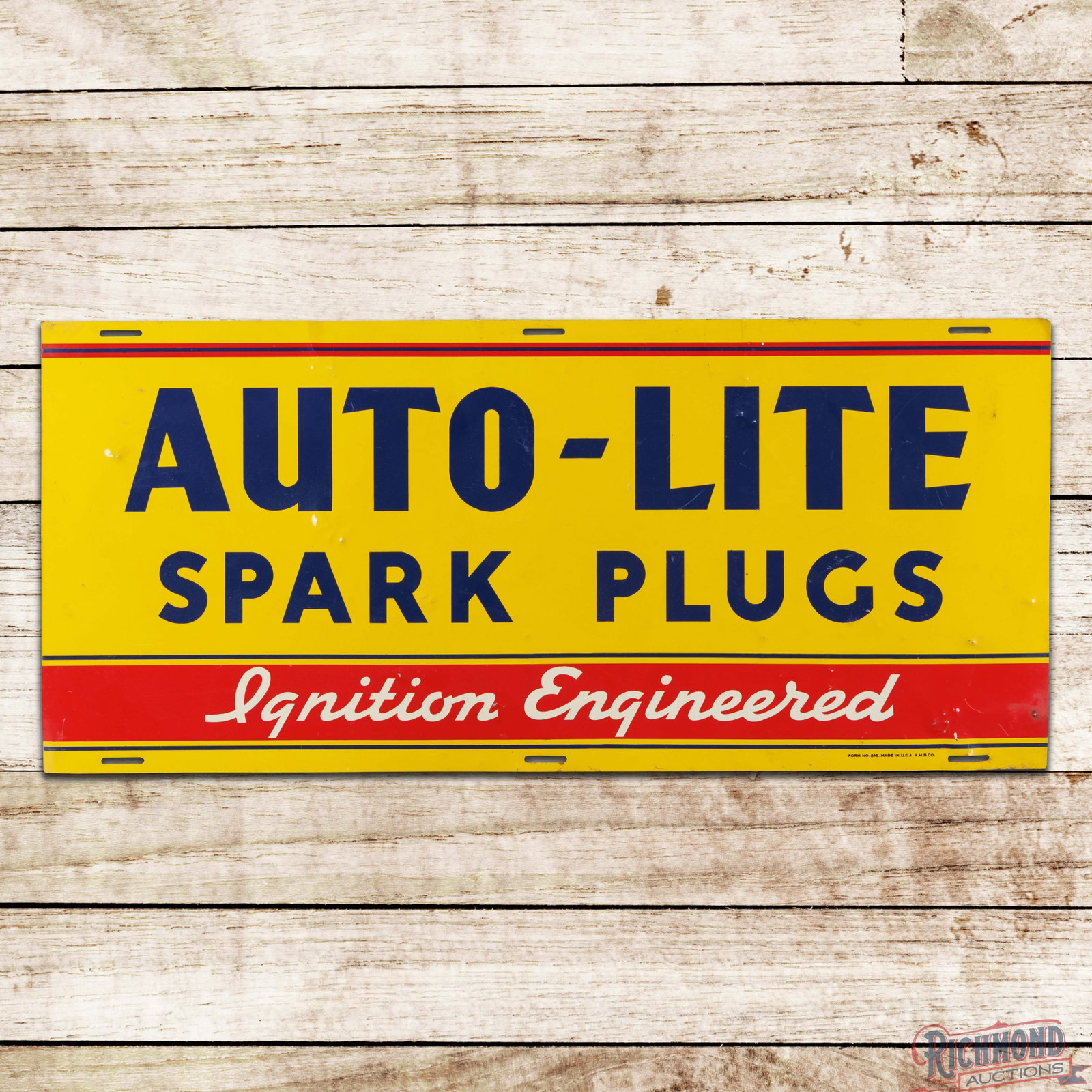 Autolite Spark Plugs "Ignition Engineered" Single Sided Tin Sign: SST (single sided tin) sign has very good color and shine. The field has small fine scratches with numerous tiny dings and light bends. The perimeter has larger bends with small areas of discoloration