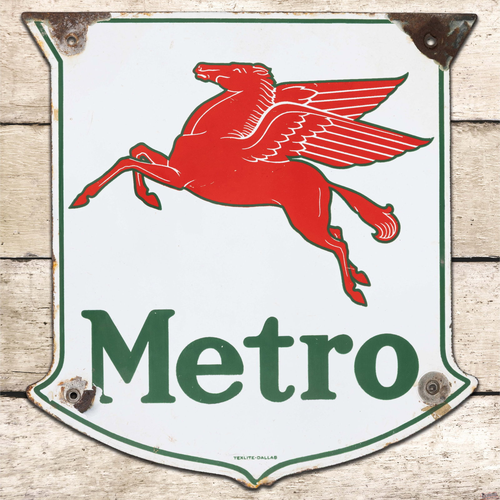 Metro Gasoline Single Sided Porcelain Pump Plate Sign w/ Pegasus: SSP (single sided porcelain) pump plate has very good color and gloss. The field has light surface wear. The perimeter has large chips at the mounting holes, minor metal loss on the lower point, and s