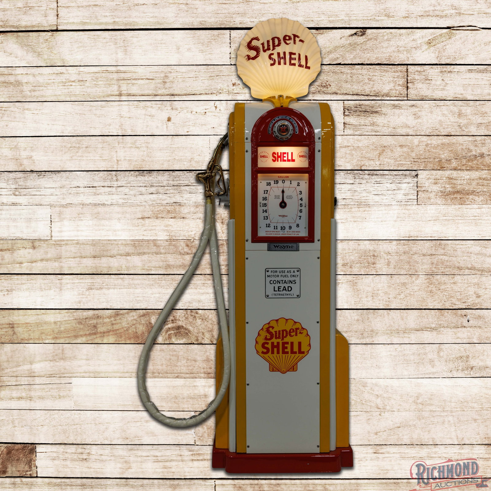 Wayne Model #866 Clock Face Gas Pump Restored Super Shell: Professionally restored. Vibrant paint with high gloss, highly detailed appointments, new cloth hose, polished brass nozzle, reproduction OPC Super-Shell milk glass globe. 96" H. Condition: Profession